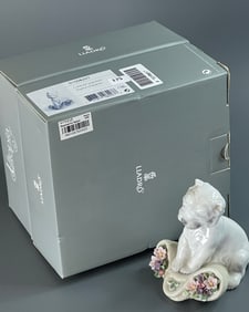 Lladro 01008207 Playful Character Porcelain Figurine is a hand-made collectible piece crafted in
