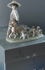 My Little Explorers Boy with Dogs Figurine Glossy Porcelain Figurine of a Boy with a Hat Walking