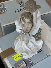 Llladro 07649 La Infancia Figurine of a Woman with a Small Boy and he is Holding Three Flying Birds