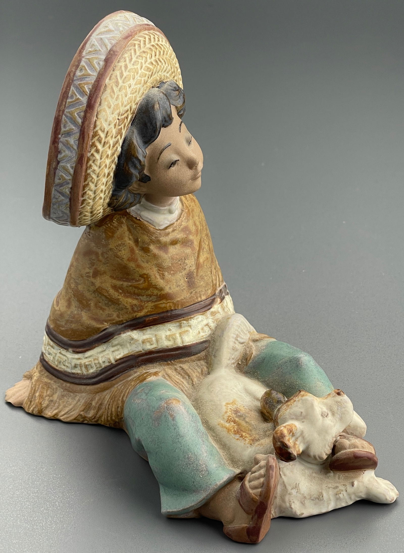 Lladro Paco Pancho 2166 Gres Porcelain Figurine Mexican Boy Wearing a Poncho and Sombrero Sitting: Lladro Paco Pancho 2166 Gres Porcelain Figurine Mexican Boy Wearing a Poncho and Sombrero Sitting with His Dog Sculpted by Jose Puche Introduced in 1987 and Retired in 1994 Made in Spain Valencia