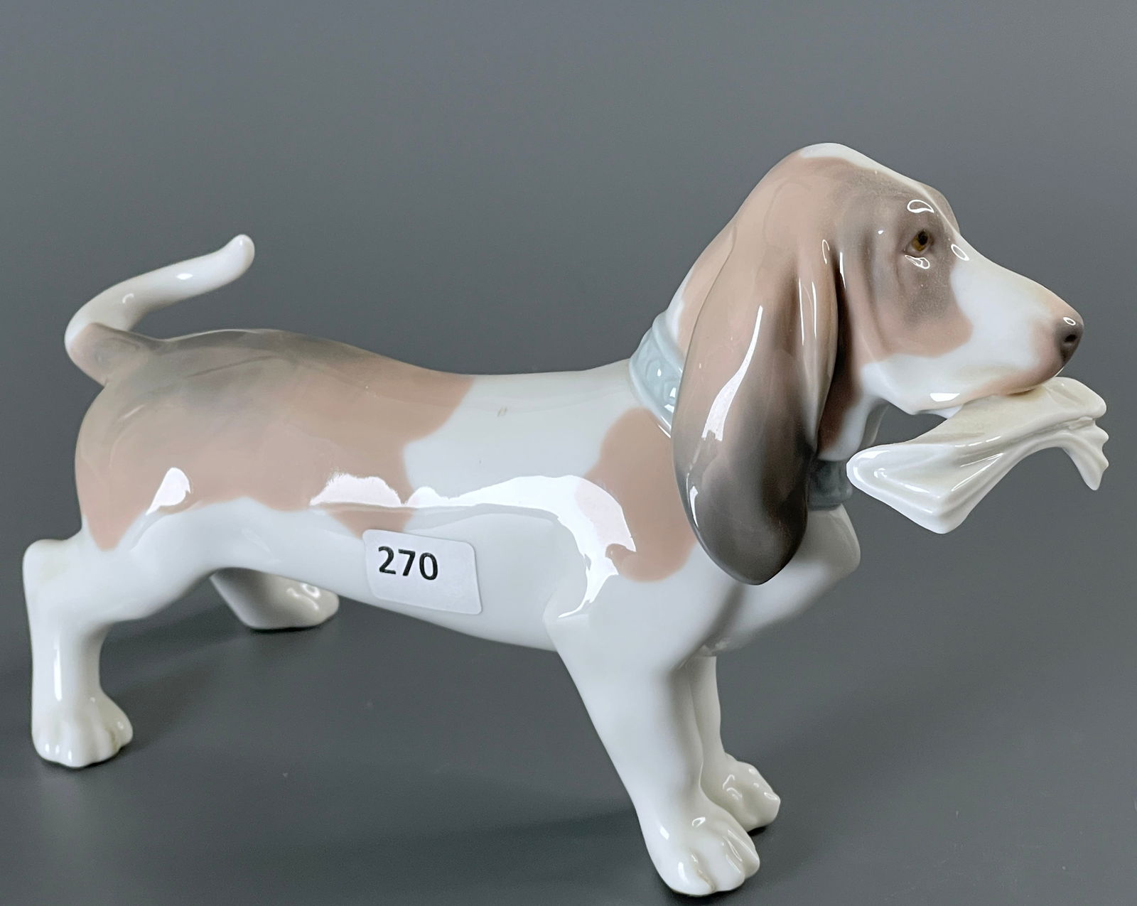 Porcelain Basset Hound with Newspaper Morning Delivery 6398 Lladro Figurine: Porcelain Basset Hound with Newspaper Morning Delivery 6398 Lladro Figurine