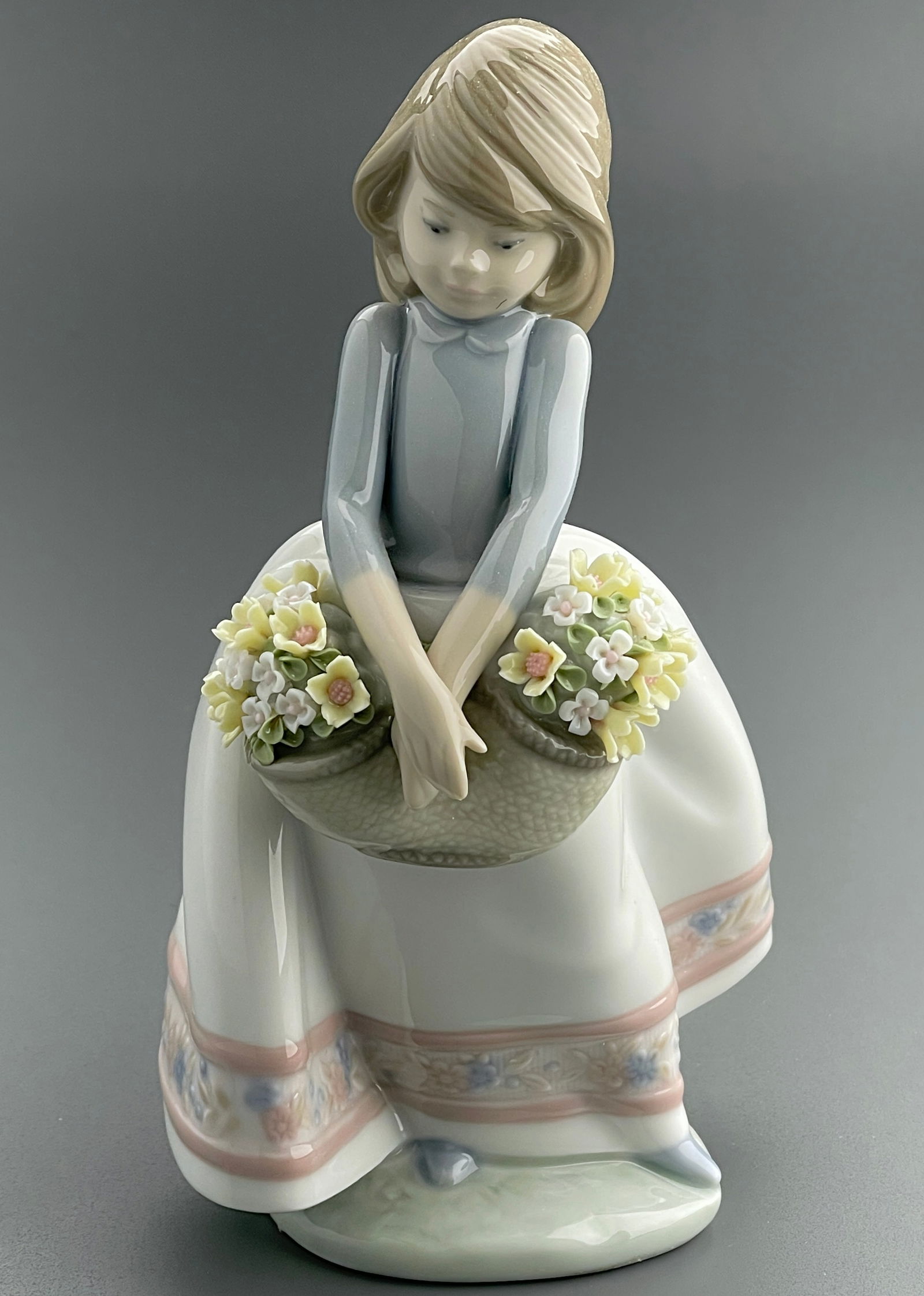 May Flowers Lladro Item #01005467 Spanish Name Dulcemente Timida Sculptor Juan Huerta Year Issued: May Flowers Lladro Item #01005467 Spanish Name Dulcemente Timida Sculptor Juan Huerta Year Issued 1988 Year Retired 2022 Last Retail $510.00