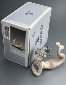 Lladro Mermaid Figurine Fantasy #1414 with a Lei Around Her Neck and Flowers in Her Hair Retail