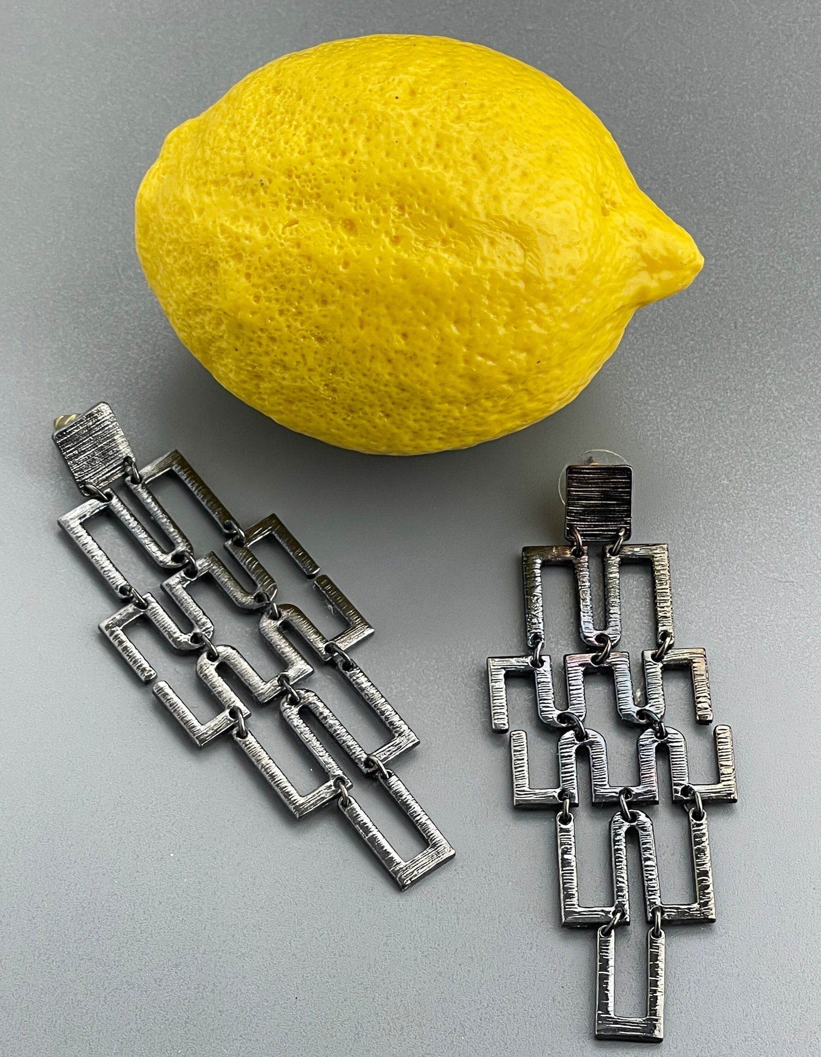 Blackened White Metal Chandelier Earrings Brutalist Minimalist Art Deco Geometric Design: Blackened White Metal Chandelier Earrings Brutalist Minimalist Art Deco Geometric Design Approximately 3 5/8 x 1 1/4 inches.