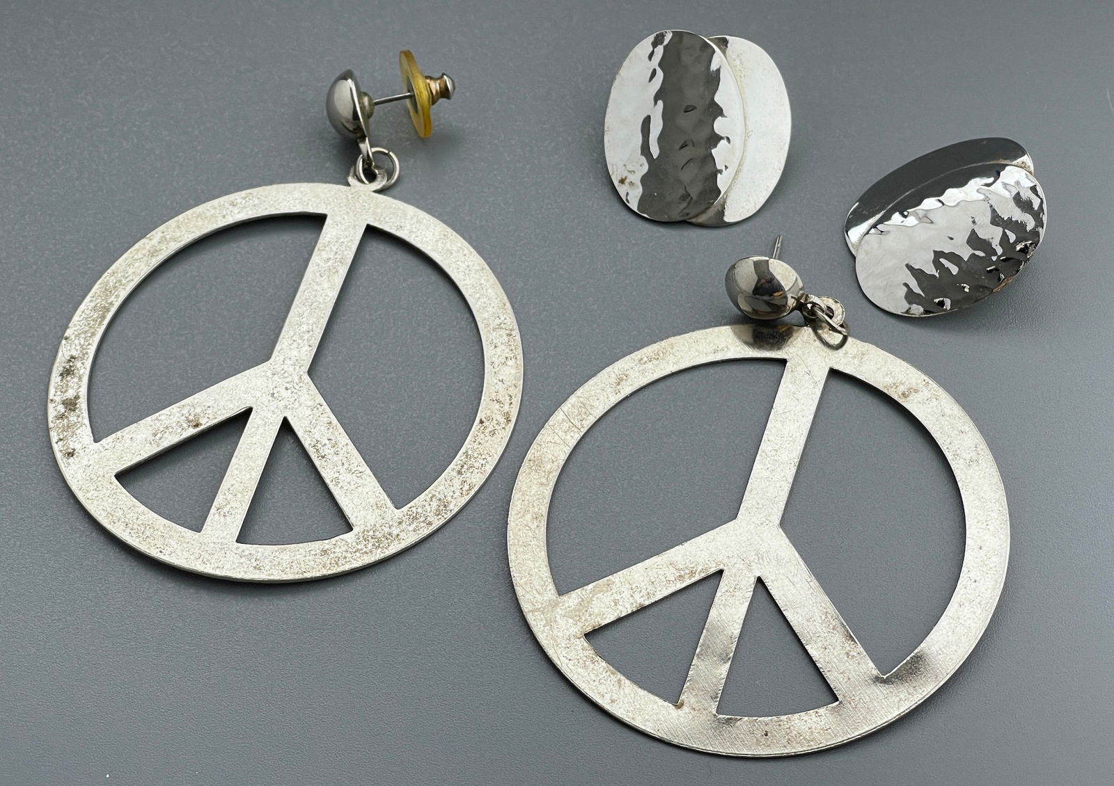Hippie Era Peace Earrings together with other White Metal Hammered Vintage Clip Earrings from 1970-s (1 of 2)