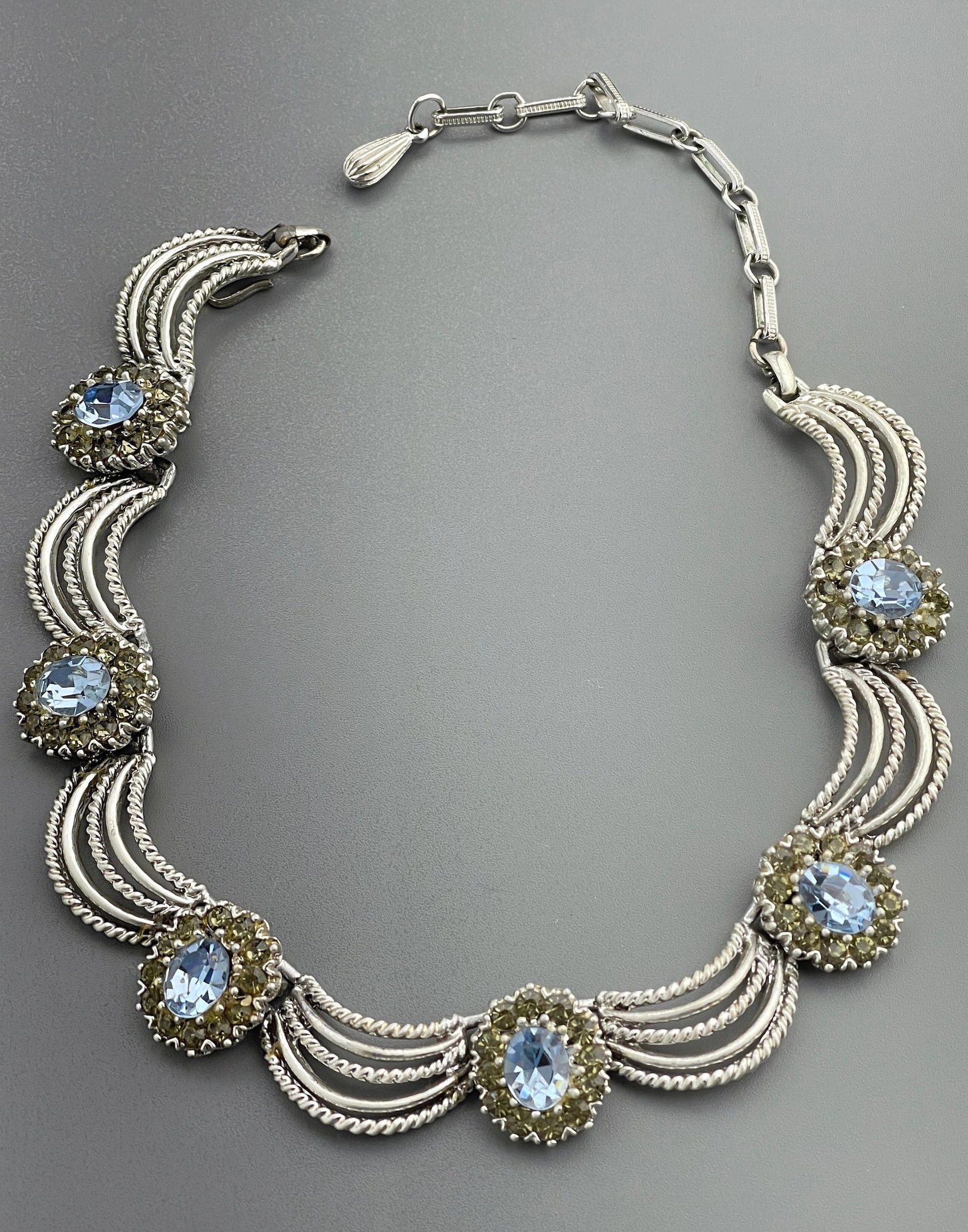 Vintage Costume Jewelry Rhinestone Necklace: Vintage Costume Jewelry Rhinestone Necklace Approximately 10 1/4 inches side to side measures without the hook and extension chain.