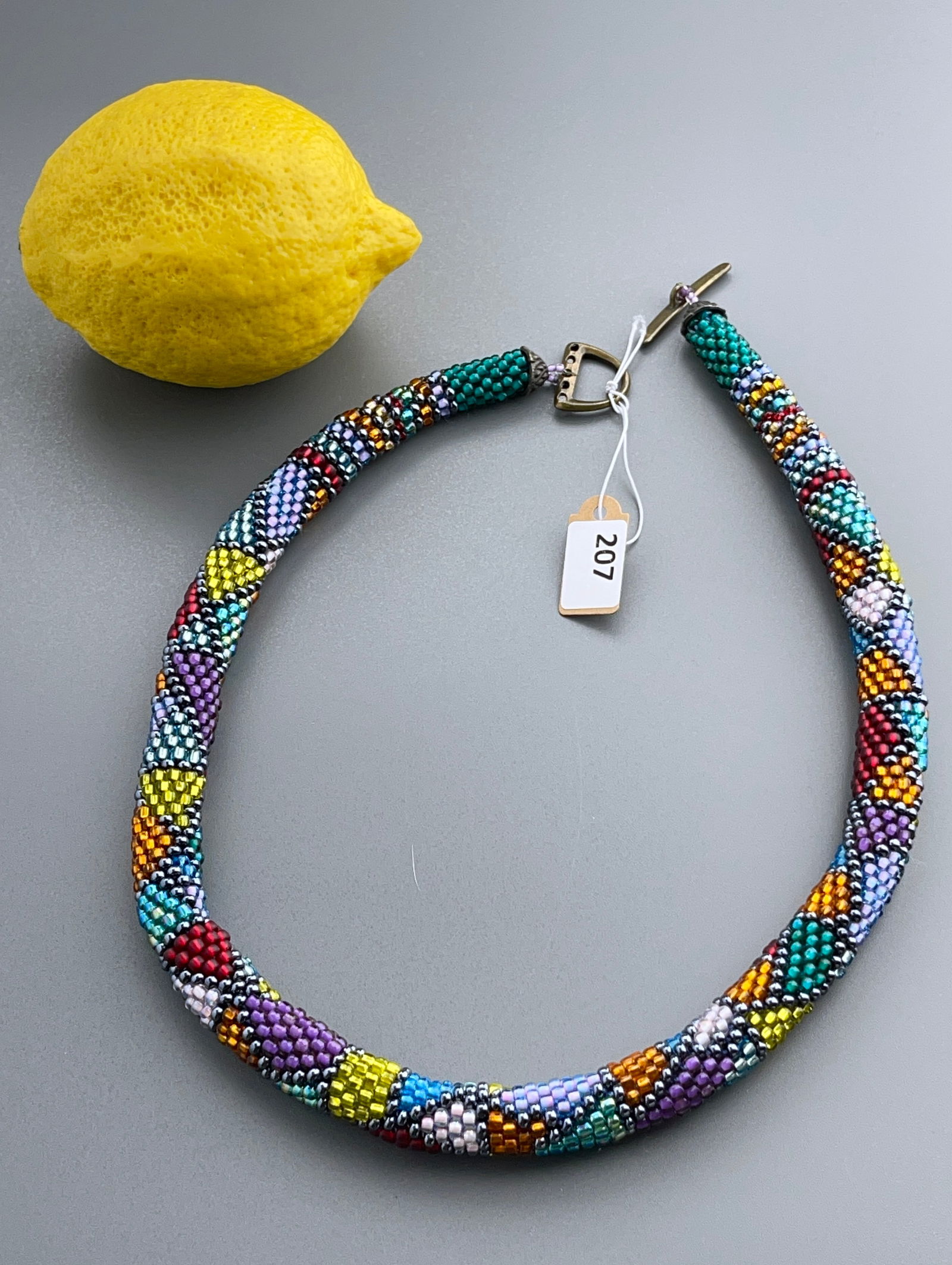 Colorful Beaded Snake Necklace: Colorful Beaded Snake Necklace Approximately 19 1/2 inches side to side.