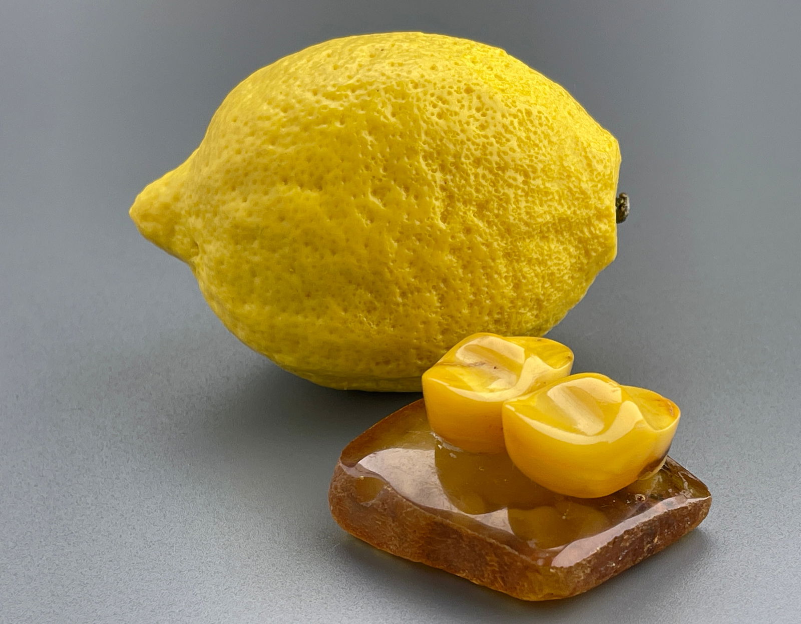 Vintage Amber Carved Clogs Pendant: Vintage Amber Carved Clogs Pendant Approximately 1 1/2 x 1 3/4 inches without the bail.