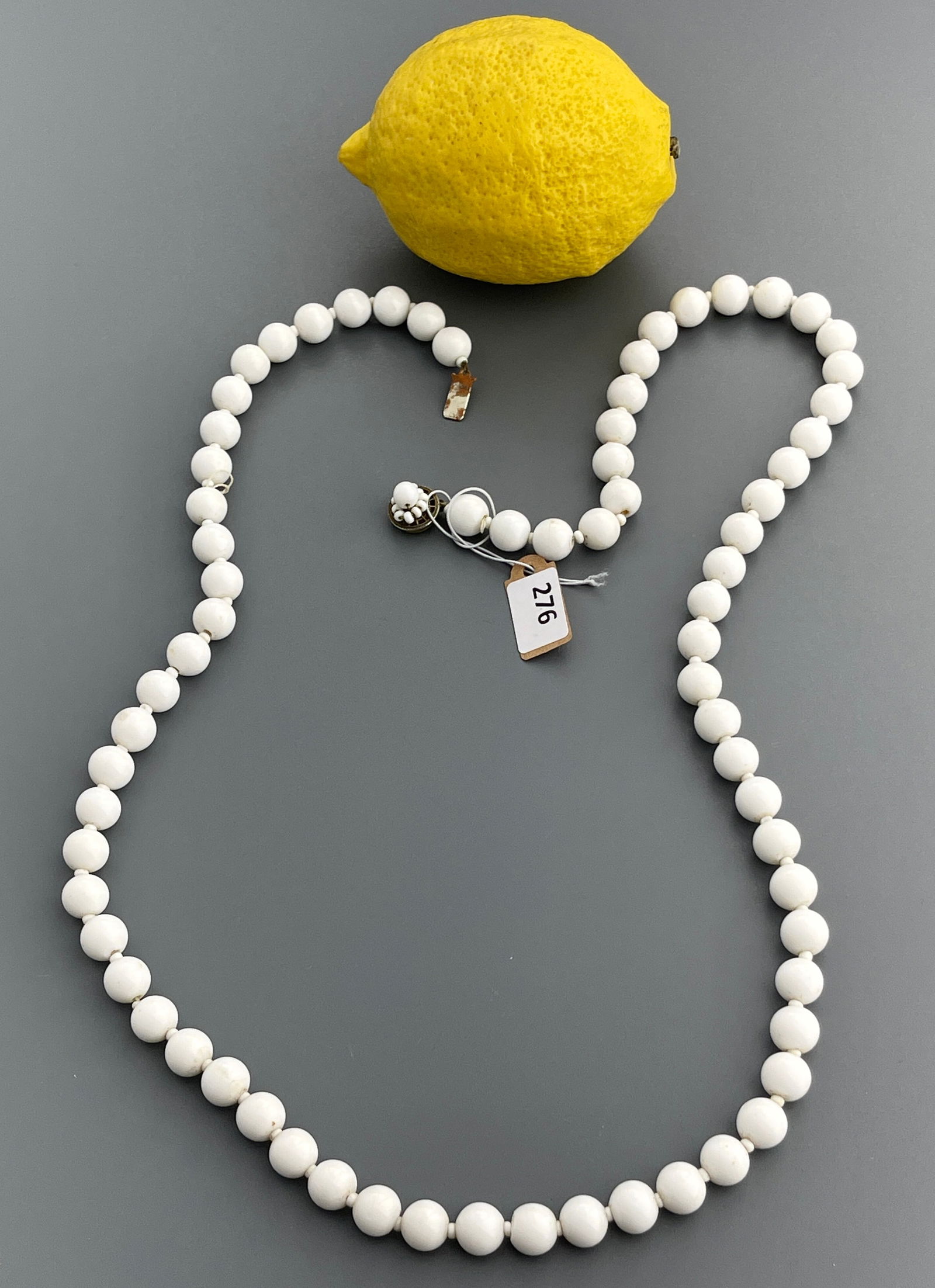 Miriam Haskell White Milk Glass Beads Single Strand Necklace c 1970: Miriam Haskell White Milk Glass Beads Single Strand Necklace c 1970 Approximately 31 inches side to side.