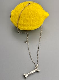 Sterling Silver Bone Pendant on Chain Marked Sterling on the Clasp