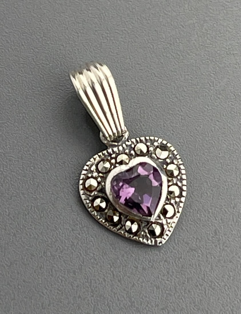 Amethyst Heart Marcasite Sterling Silver Pendant: Amethyst Heart Marcasite Sterling Silver Pendant Approximately 7/8 inches on the bail.