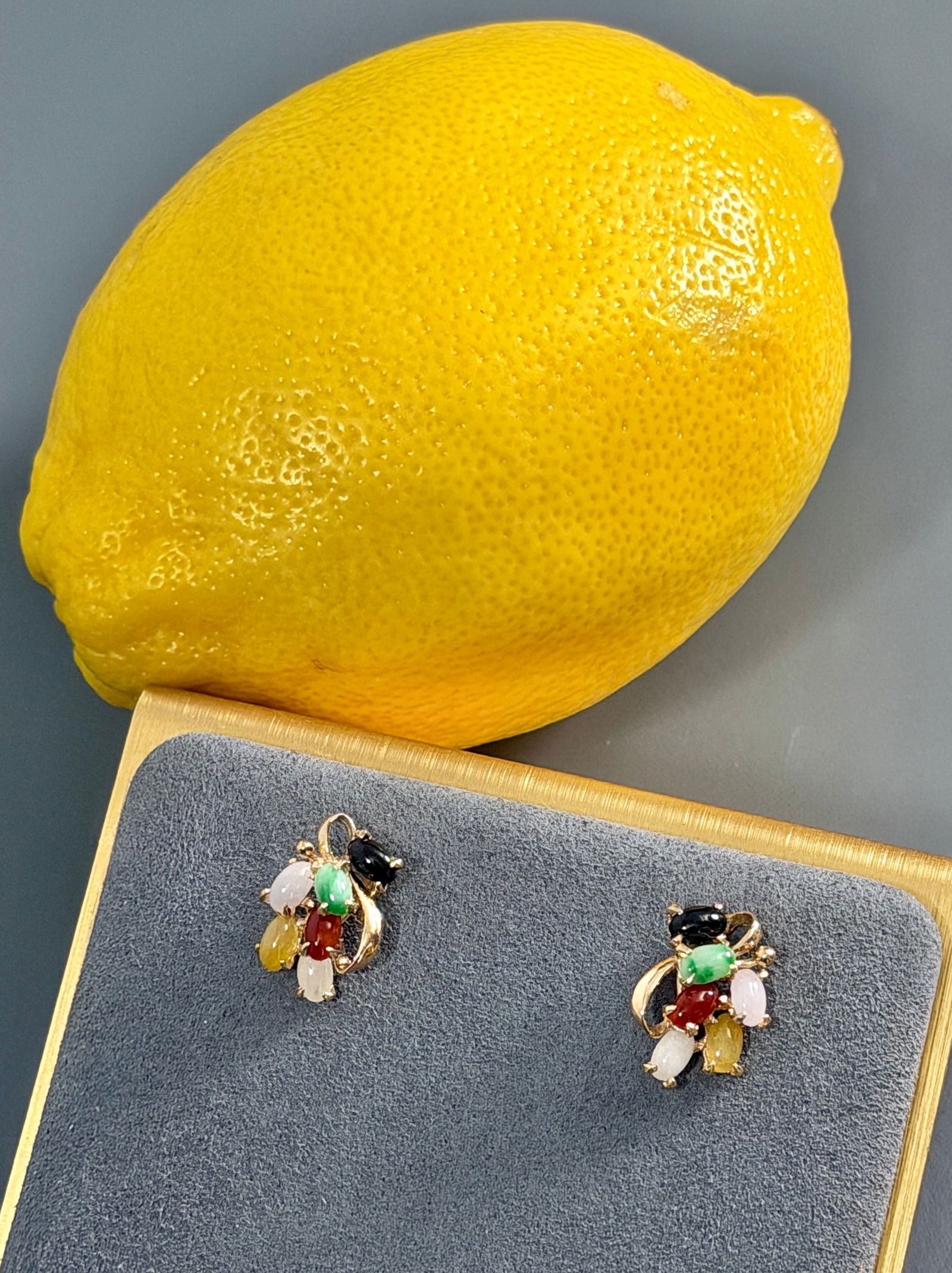 Vintage 14K Yellow Gold Green Jade & Semi Precious Gemstone Pair of Stud Earrings from Hong Kong: Vintage 14K Yellow Gold Green Jade & Semi Precious Gemstone Pair of Stud Earrings from Hong Kong Jeweler Approximately 5/8 x 3/8 inches. For all high ticket items, including watches and jewelry, thebu