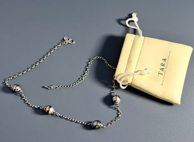 Tara Black Pearl Necklace on Sterling Silver Chain Measured 20 1/4 inches side to side.