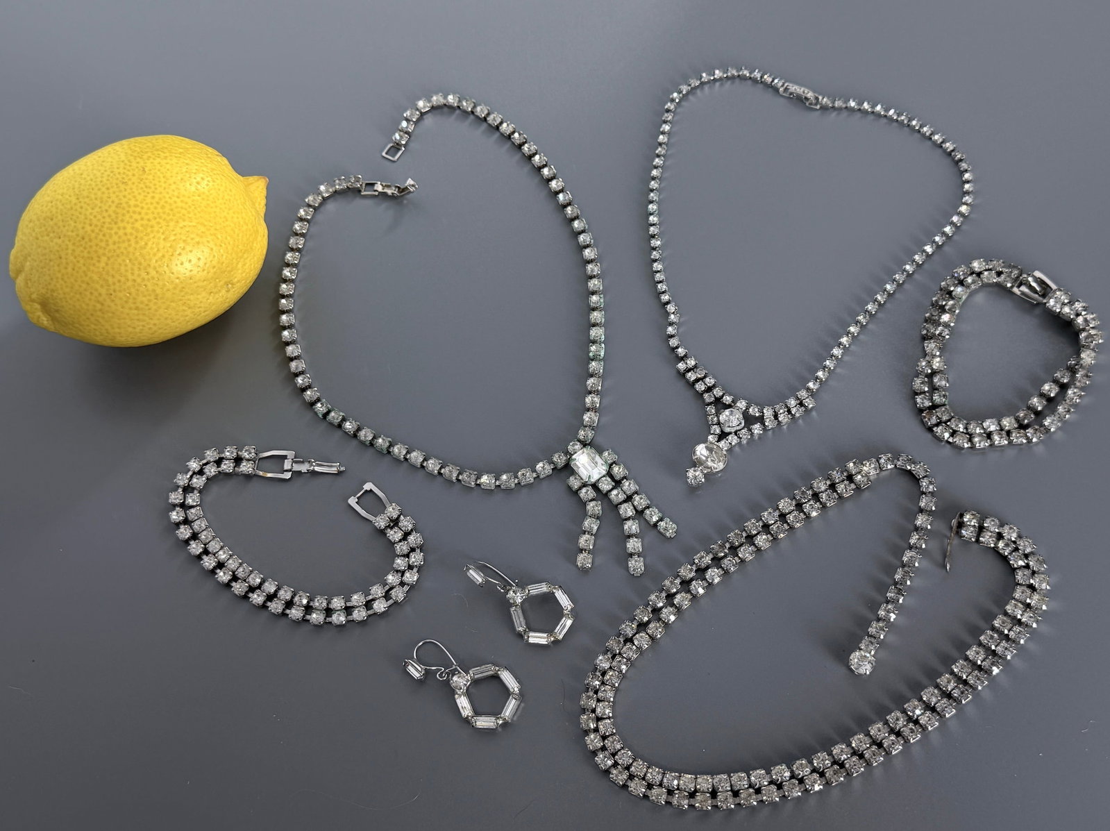 Lot of Vintage Rhinestone Jewelry Necklaces & Bracelets: Lot of Vintage Rhinestone Jewelry Necklaces & Bracelets For all high ticket items, including watches and jewelry, thebuyer identity has to be confirmed prior to shipping. Shipping may be held until pa