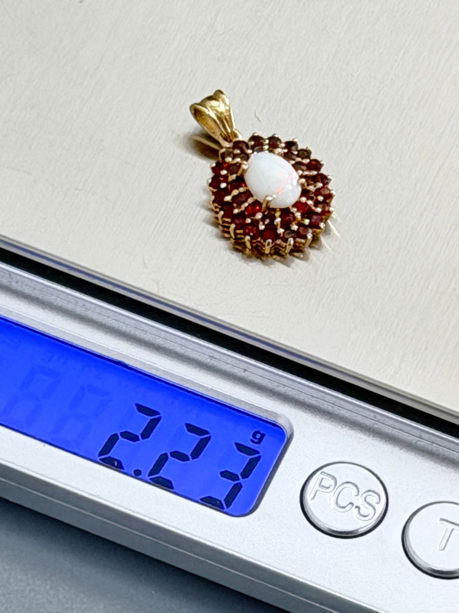 14K Gold Opal & Garnets Pendant Vintage Jewelry: 14K Gold Opal & Garnets Pendant Vintage Jewelry Approximately 7/8 x 5/8 inches overall.