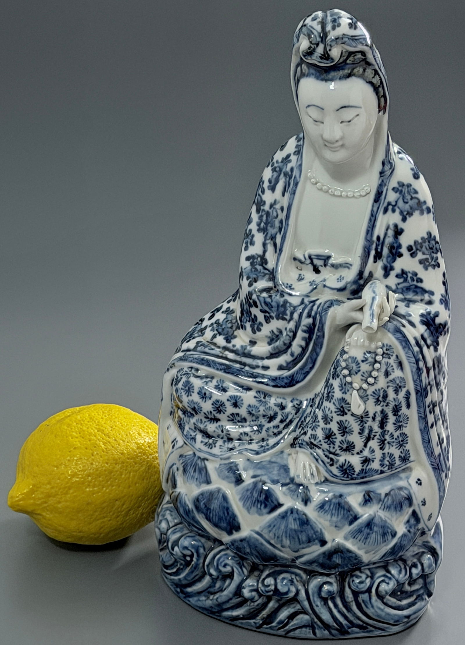 Guanyin Blue & White Chinese Porcelain Figurine East Asian Buddhism Protection Deity: Guanyin Blue & White Chinese Porcelain Figurine East Asian Buddhism Protection Deity Approximately 10 1/4 inches tall.