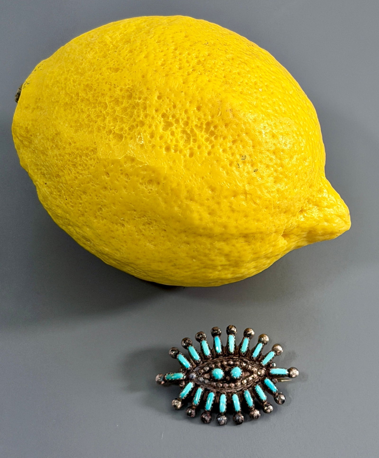 Zuni Tribe Snake Eye Turquoise Petit Point Cluster Brooch Vintage Traditional Native American: Zuni Tribe Snake Eye Turquoise Petit Point Cluster Brooch Vintage Traditional Native American Sterling Silver Jewelry Approximately 1 3/8 x 15/16 inches.