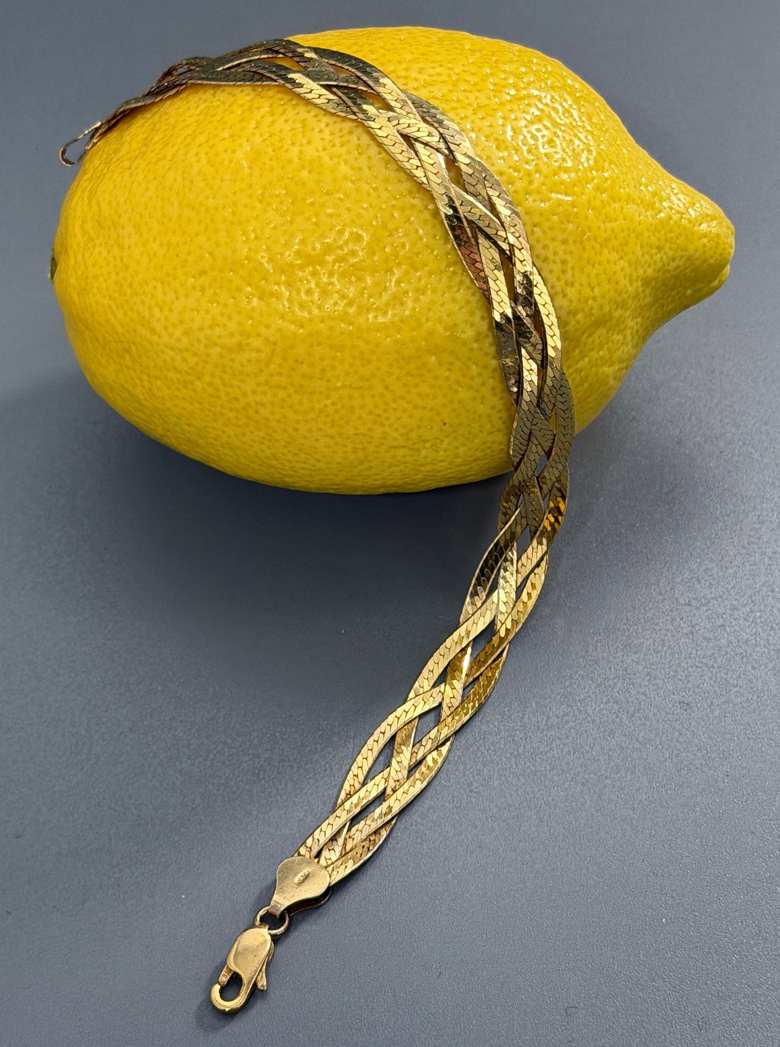 Vintage Italian Gold Plated Sterling Silver Braided Bracelet Marked 925 Italy: Vintage Italian Gold Plated Sterling Silver Braided Bracelet Marked 925 Italy Approximately 7 7/8 inches measured side to side.