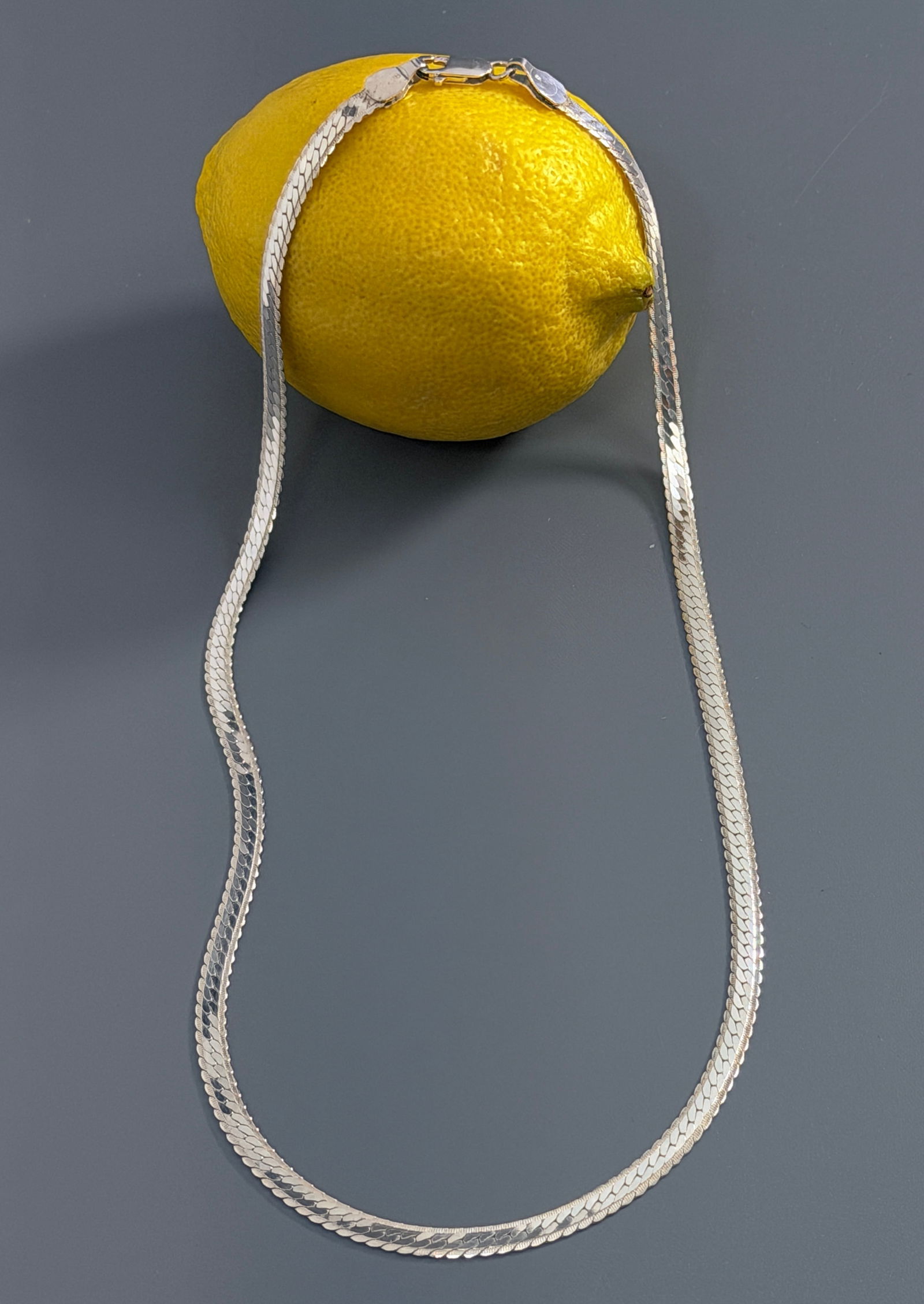 Vintage Italian Sterling Silver Flat Link Neck Chain Necklace with Lobster Clasp Marked 925 Italy: Vintage Italian Sterling Silver Flat Link Neck Chain Necklace with Lobster Clasp Marked 925 Italy Approximately 18 1/8 inches side to side.