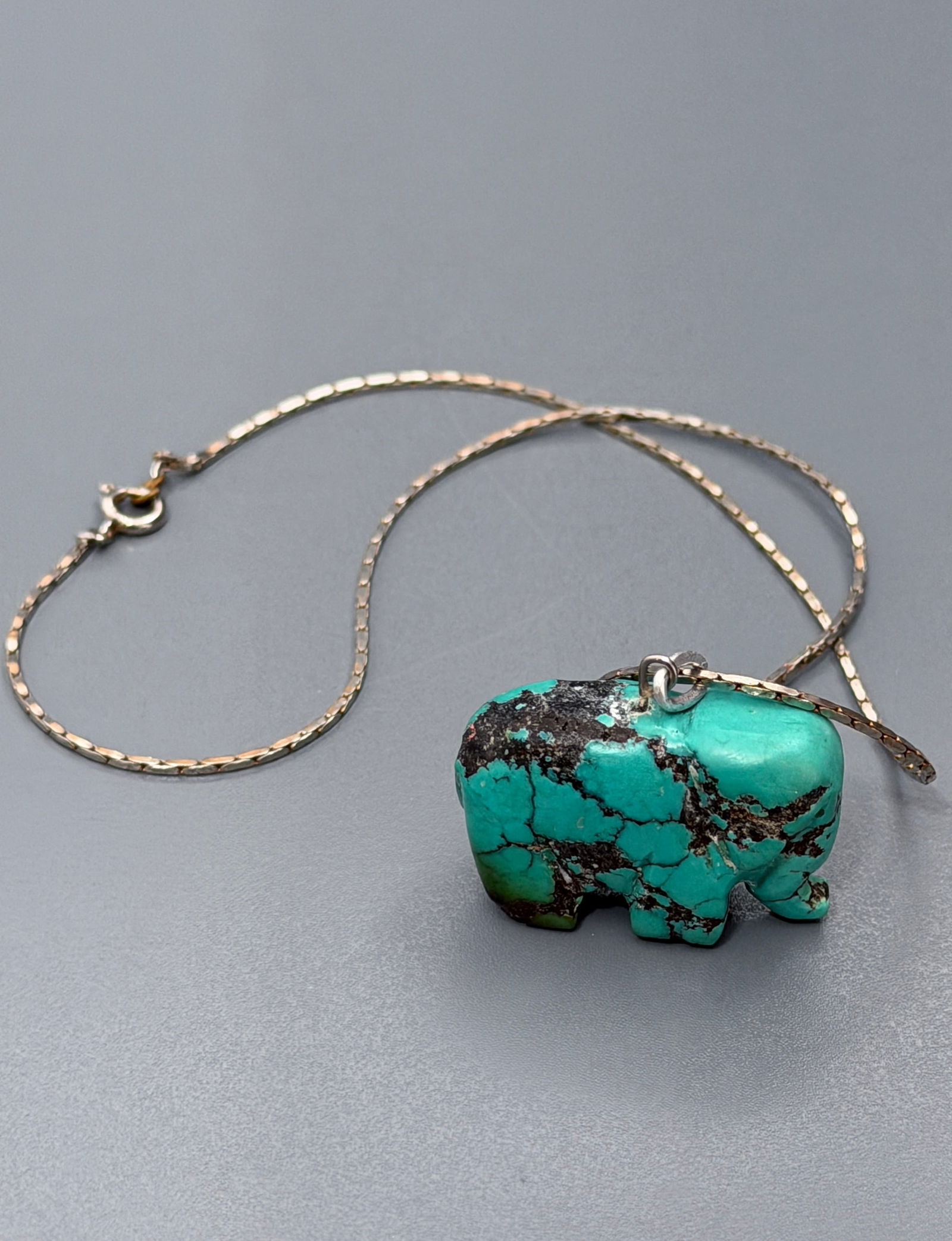 Carved Turquoise Elephant Figurine Pendant Jewelry Charm: Carved Turquoise Elephant Figurine Pendant Jewelry Charm Approximately 1 1/4 x 3/8 x 3/4 inches tall.