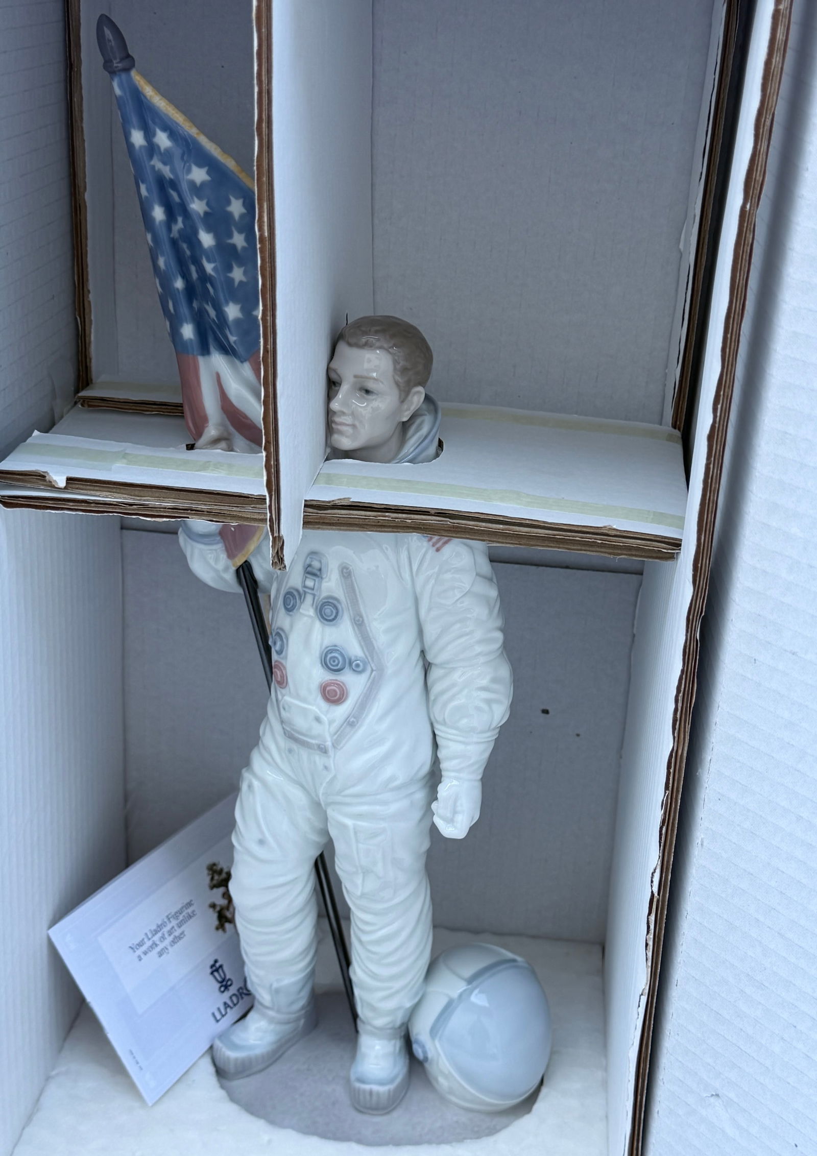 Lladro 6168 Astronauta Americano Large Porcelain Figurine Commemorates the 25th Anniversary of the: Lladro 6168 Astronauta Americano Large Porcelain Figurine Commemorates the 25th Anniversary of the Moon Landing Approximately 16 1/2 inches tall.
