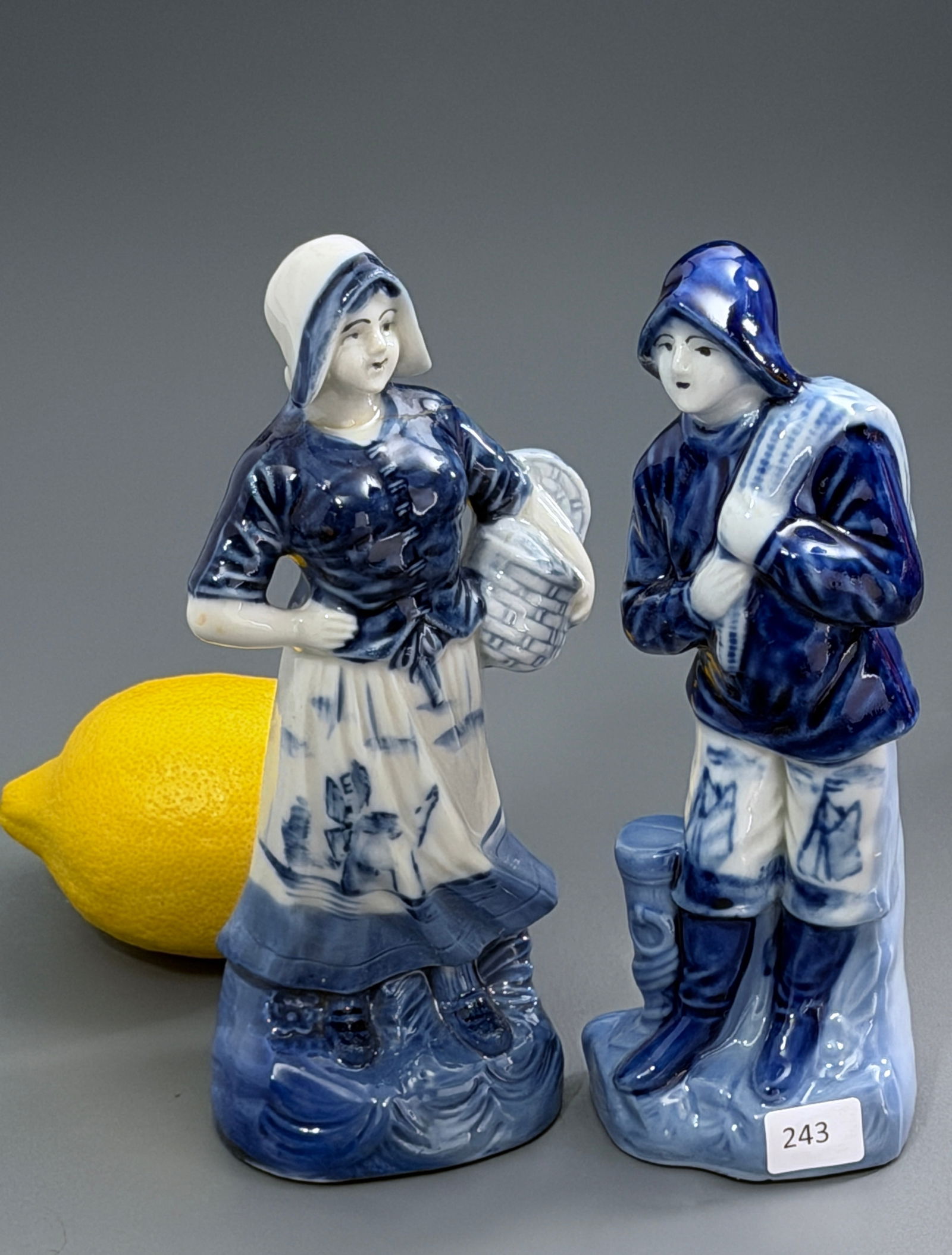 Flow Blue Dutch Fisherman Figurine Vintage Cobalt Porcelain Pair Made in Japan: Flow Blue Dutch Fisherman Figurine Vintage Cobalt Porcelain Pair Made in Japan Approximately 7 1/16 inches tall.