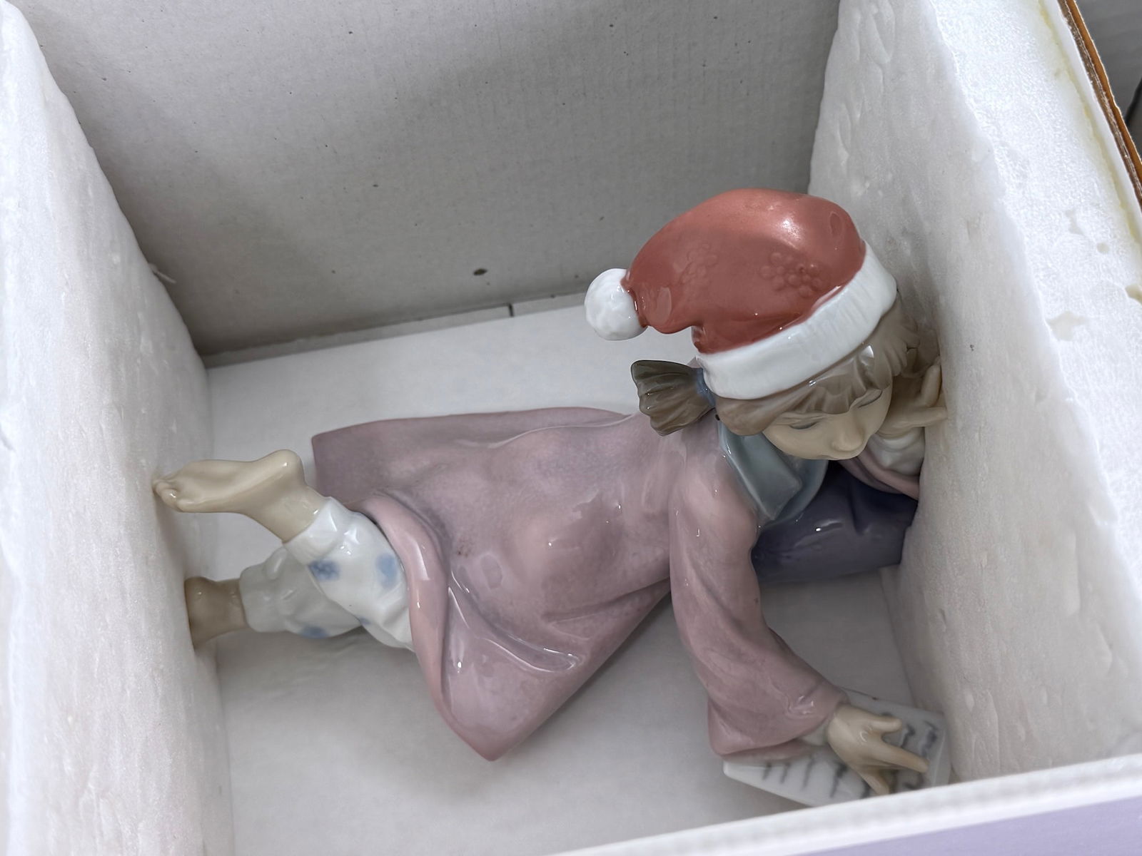Lladro 6194 Figurine of a boy writing a letter to Santa Claus titled Christmas Wishes Spanish Name (1 of 2)