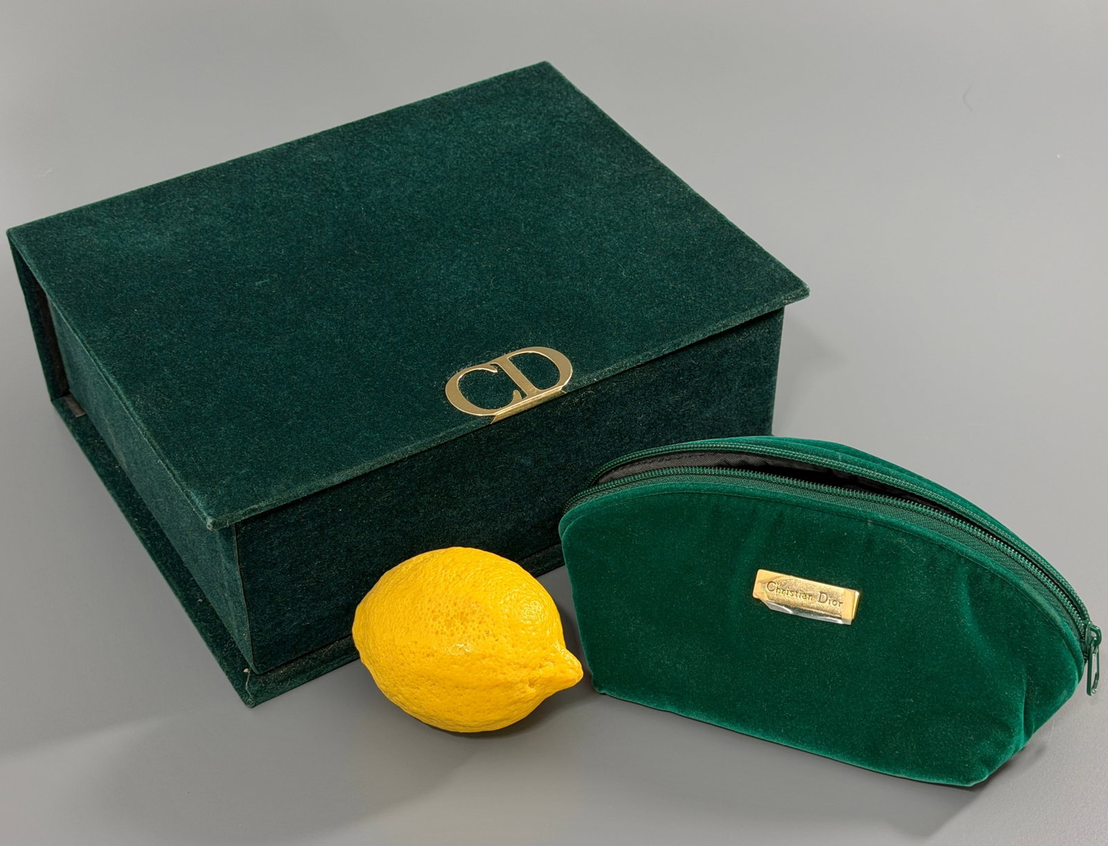 Christian Dior Emerald Green Velvet Box and Zippered Pouch: Christian Dior Emerald Green Velvet Box and Zippered Pouch Approximately 9 1/2 x 7 1/2 x 3 1/2 inches.