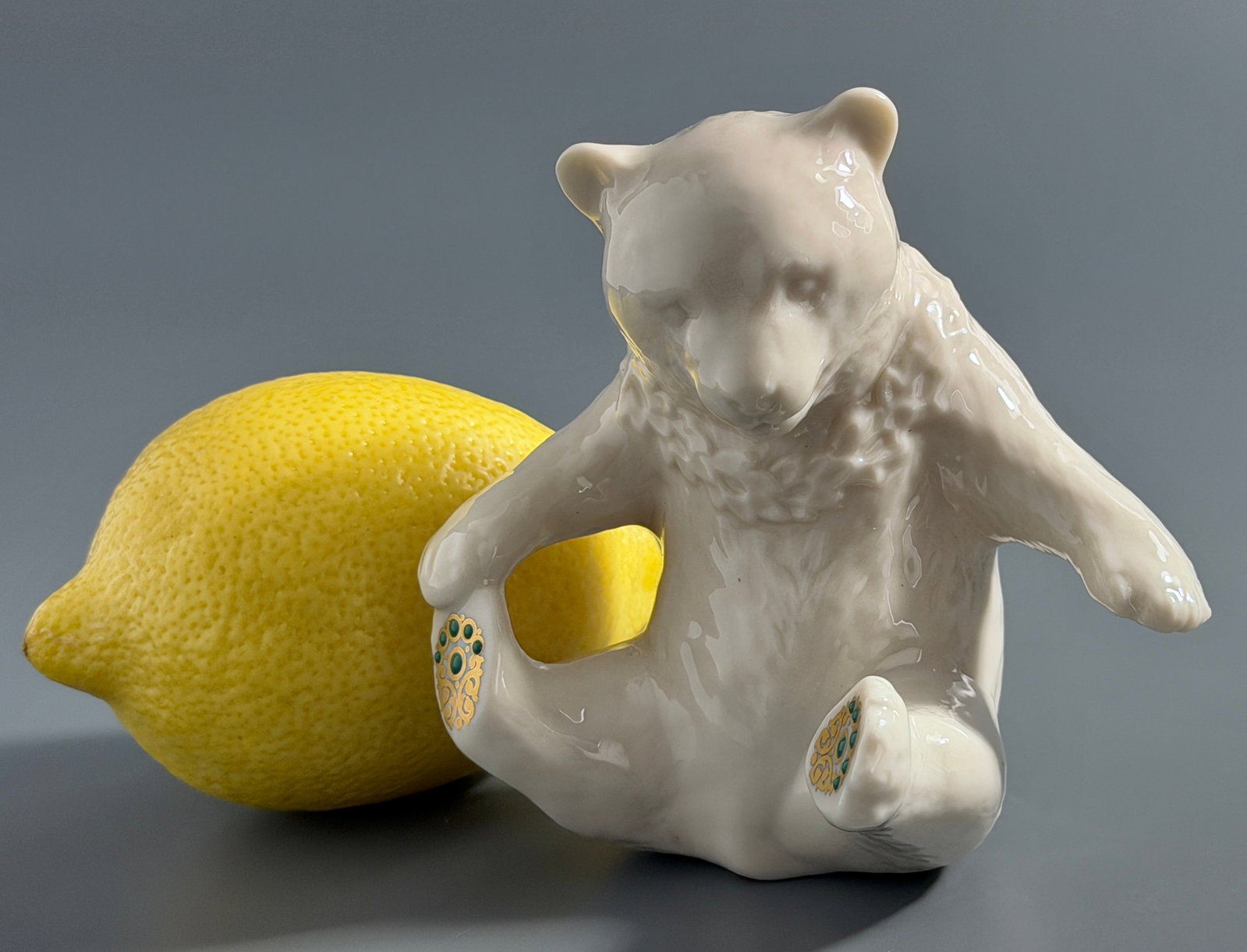 Sitting Bear Green Turquoise Jeweled 24k Gold Accented Paws Ivory Bone China Figurine by Lenox China: Sitting Bear Green Turquoise Jeweled 24k Gold Accented Paws Ivory Bone China Figurine by Lenox China Jewels Collection Approximately 4 x 3 x 3 3/4 inches tall.