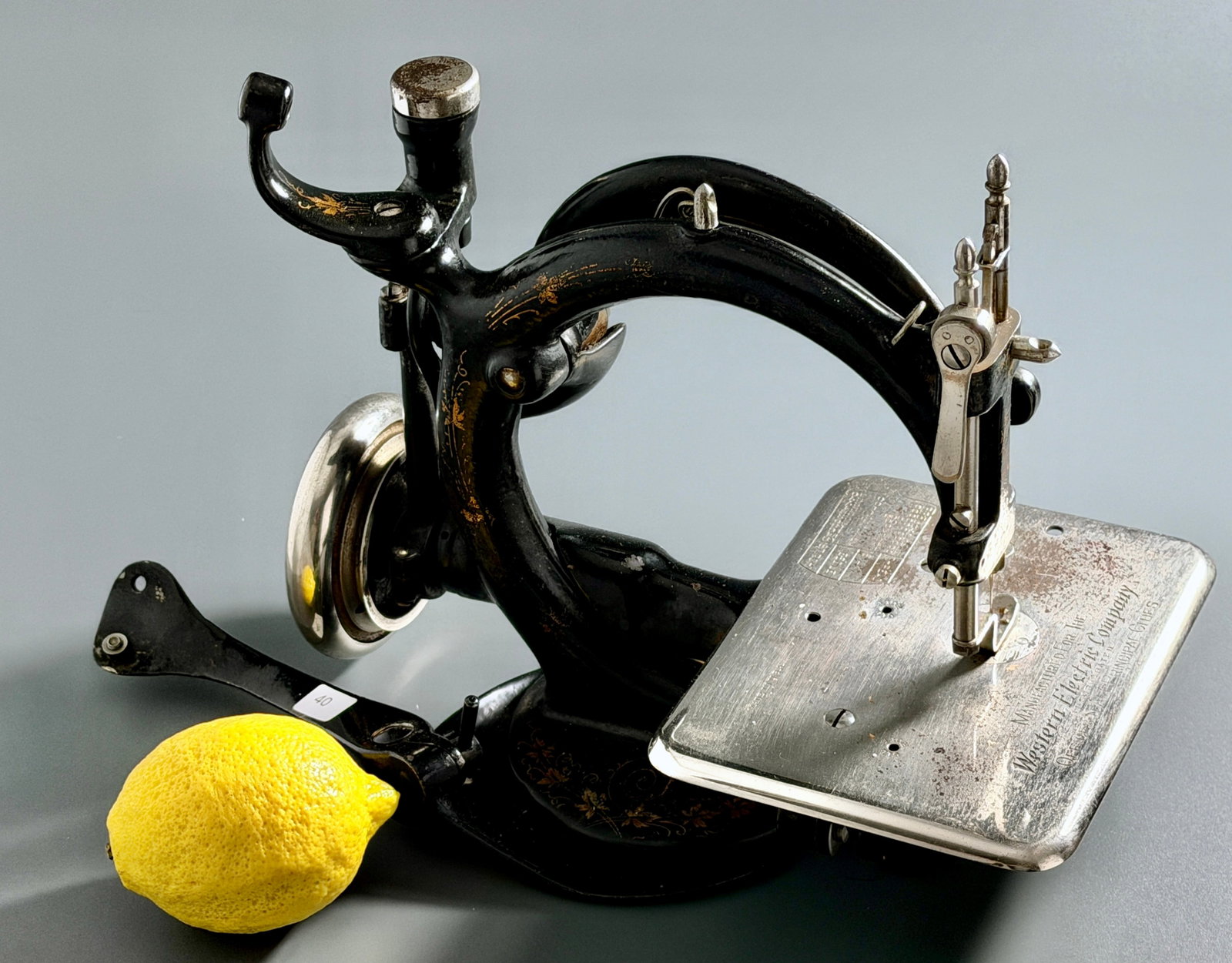 Antique Willcox & Gibbs Miniature Sewing Machine Western Electric Company Chainstitch Cast Iron: Antique Willcox & Gibbs Miniature Sewing Machine Western Electric Company Chainstitch Cast Iron Approximately 10 1/4 x 6 x 8 1/2 inches tall.