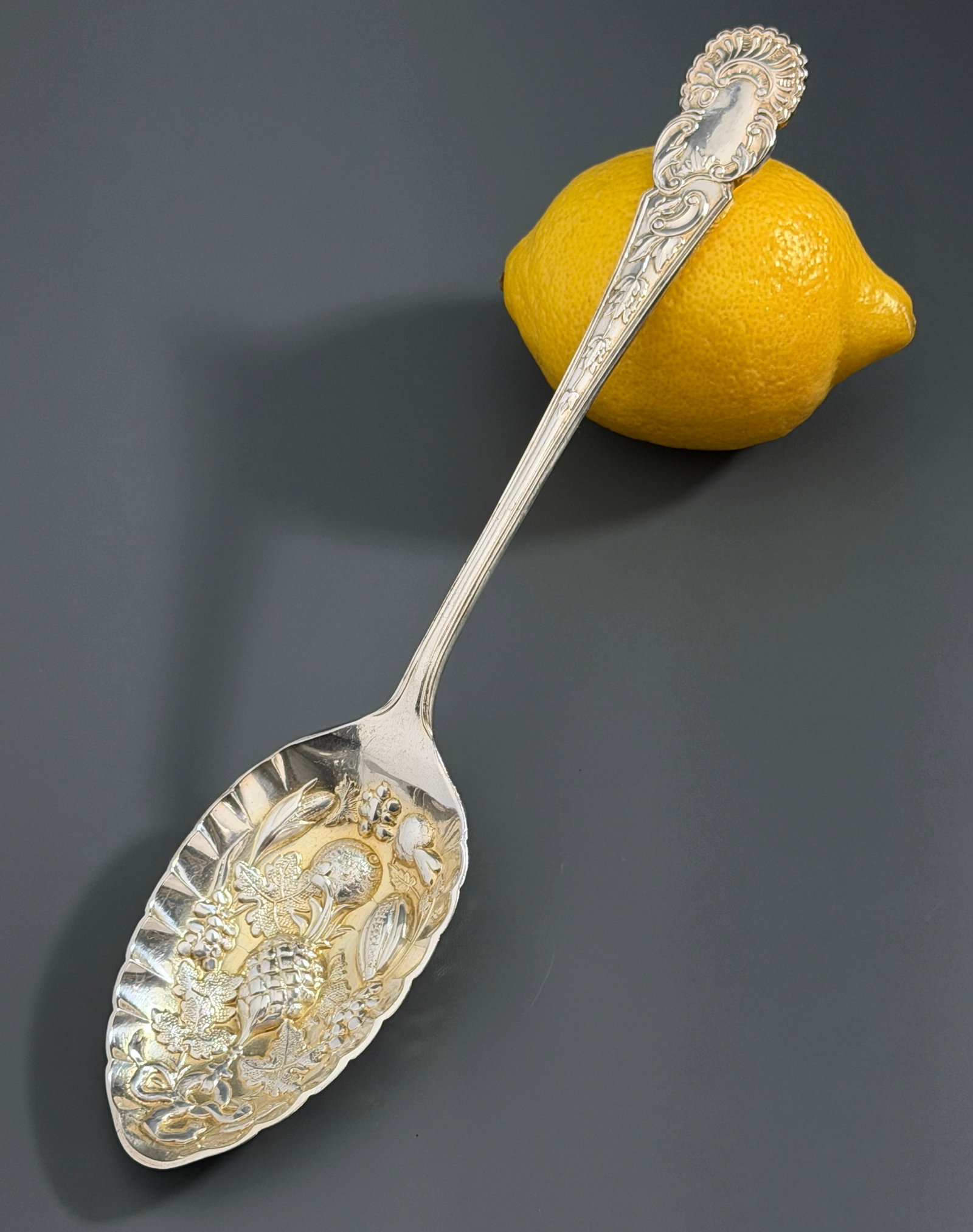 Antique Victorian Style English Silver Plate Fruit Berry Serving Spoon Repousse Gold Wash Gilt Bowl: Antique Victorian Style English Silver Plate Fruit Berry Serving Spoon Repousse Gold Wash Gilt Bowl Chased Handle ENGLAND Approximately 2 x 9 1/8 inches.