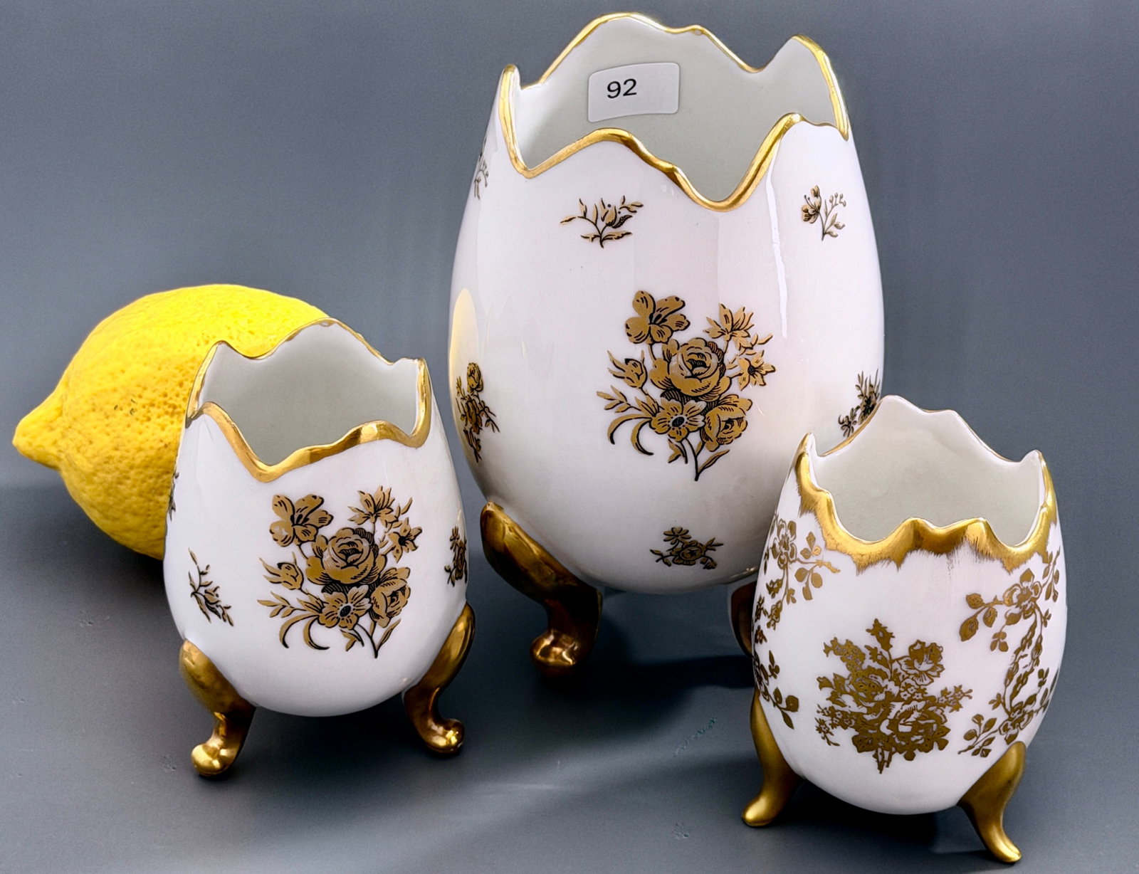 Limoges France Porcelain Egg Vase Footed Gold Chintz Floral Vanity 3-p Set H.T. Henri d'Arceau: Limoges France Porcelain Egg Vase Footed Gold Chintz Floral Vanity 3-p Set H.T. Henri d'Arceau Limoges Eggshell Measures from 3 1/16 to 5 1/16 inches tall.