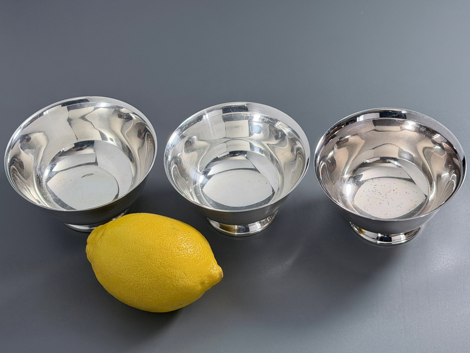 Paul Revere Style Silver Plate Footed Bowls 18th Century design nuts or candies servings.: Paul Revere Style Silver Plate Footed Bowls 18th Century design nuts or candies servings. Approximately 3 3/4 - 3 15/16 ninches in diameter x 2 1/8 - 2 1/4 inches tall.