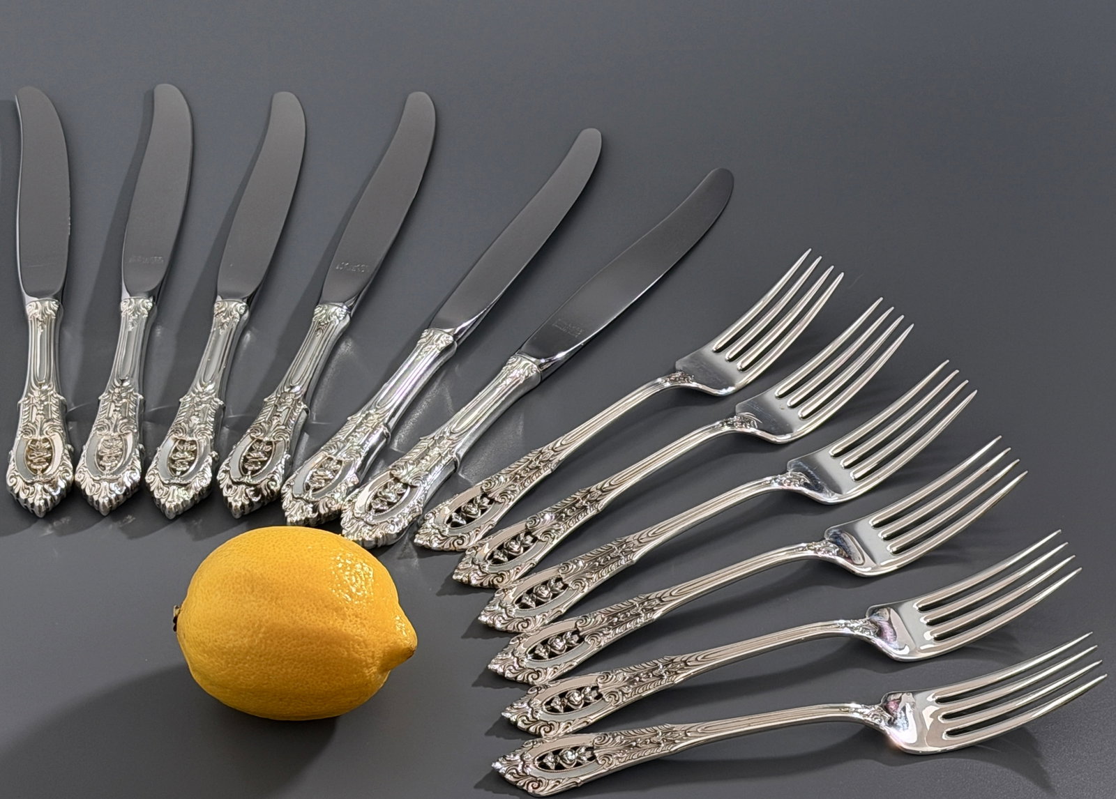 Sterling Silver Flatware Wallace Dinner Forks 287g & Dinner Knives 1934 Rose Point Pattern: Sterling Silver Flatware Wallace Dinner Forks 287g & Dinner Knives. Identical to Lot # 213. Circa1934 Rose Point Pattern openwork pierced handles vintage sterling silver flatware 6 forks averaging rou