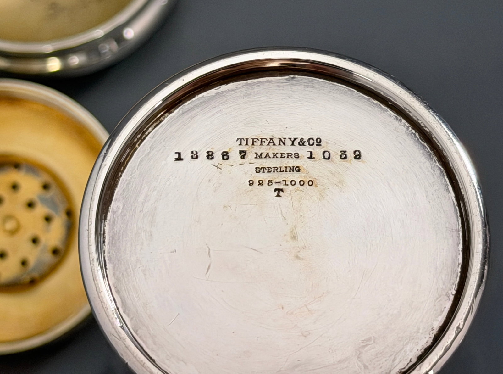 Tiffany Co Sterling Silver Talcum Powder Shifter Muffineer Vermeil Interior 159 Grams Monogrammed: Tiffany Co Sterling Silver Talcum Powder Shifter Muffineer Vermeil Interior 159 Grams Monogrammed Circa 1891-1902, production under the directorship of Charles L. Tiffany as marked with capital letter