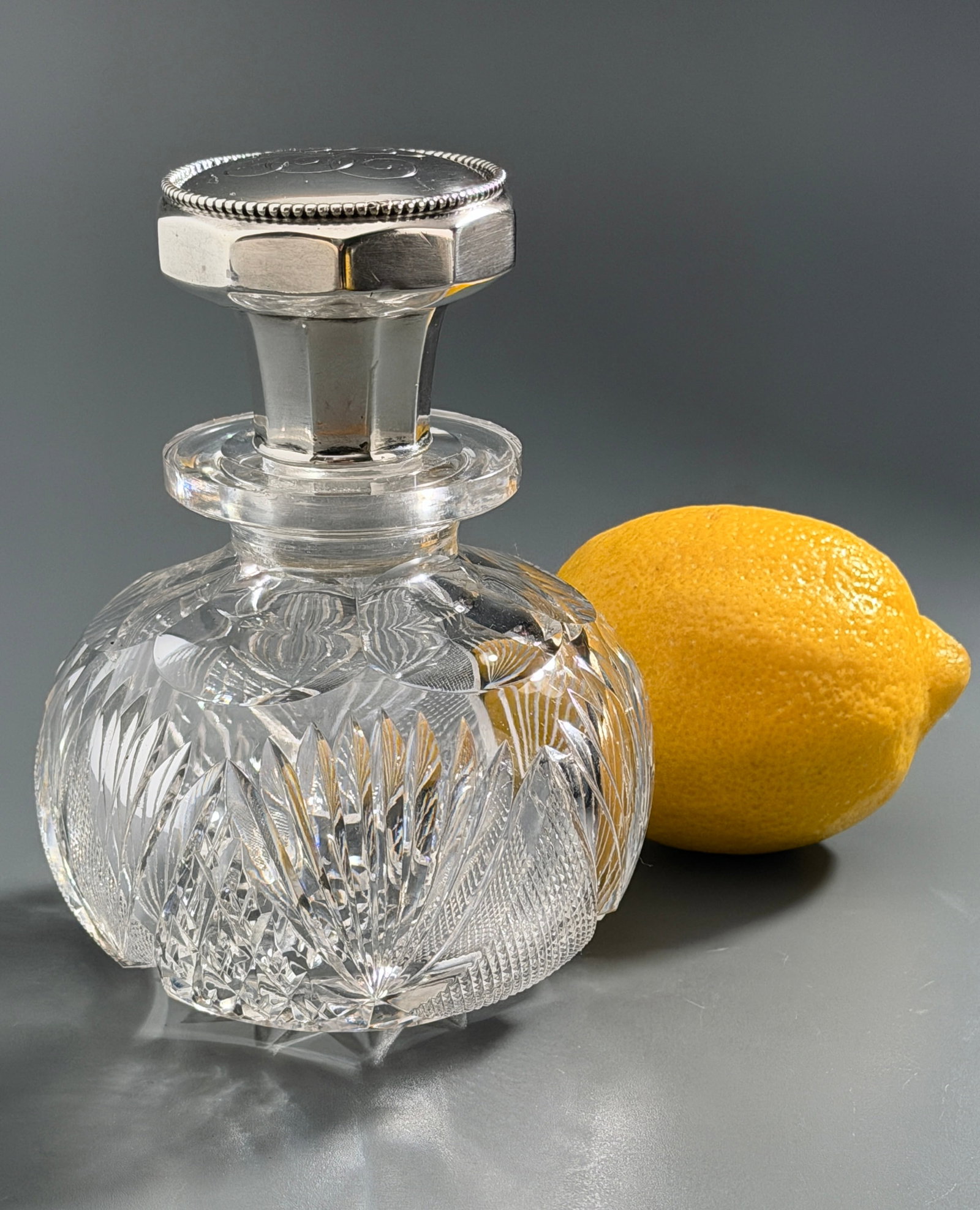 Antique American Brilliant Period Cut Glass Decanter Sterling Silver Stopper Monogrammed: Antique American Brilliant Period Cut Glass Decanter Sterling Silver Stopper Monogrammed Approximately 3 5/8 inches in diameter x 4 3/4 inches tall with stopper inserted.