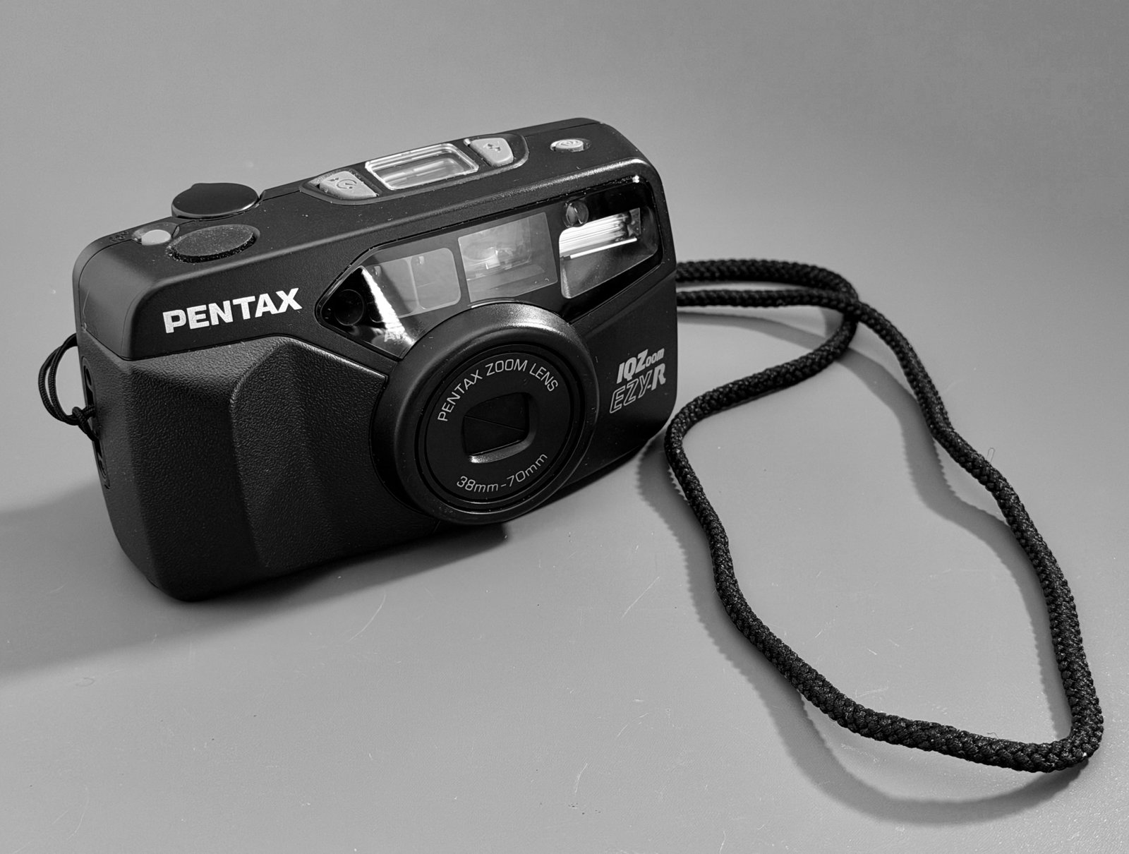 Pentax IQZoom EZY-R Point and Shoot 35mm Film Camera with Pentax 38mm-70mm Zoom Lens Quartz Date: Pentax IQZoom EZY-R Point and Shoot 35mm Film Camera with Pentax 38mm-70mm Zoom Lens Quartz Date Back Built-in Flash Autofocus Vintage Film Photography Retro Camera Serial No. 2326940 Approximately 4 