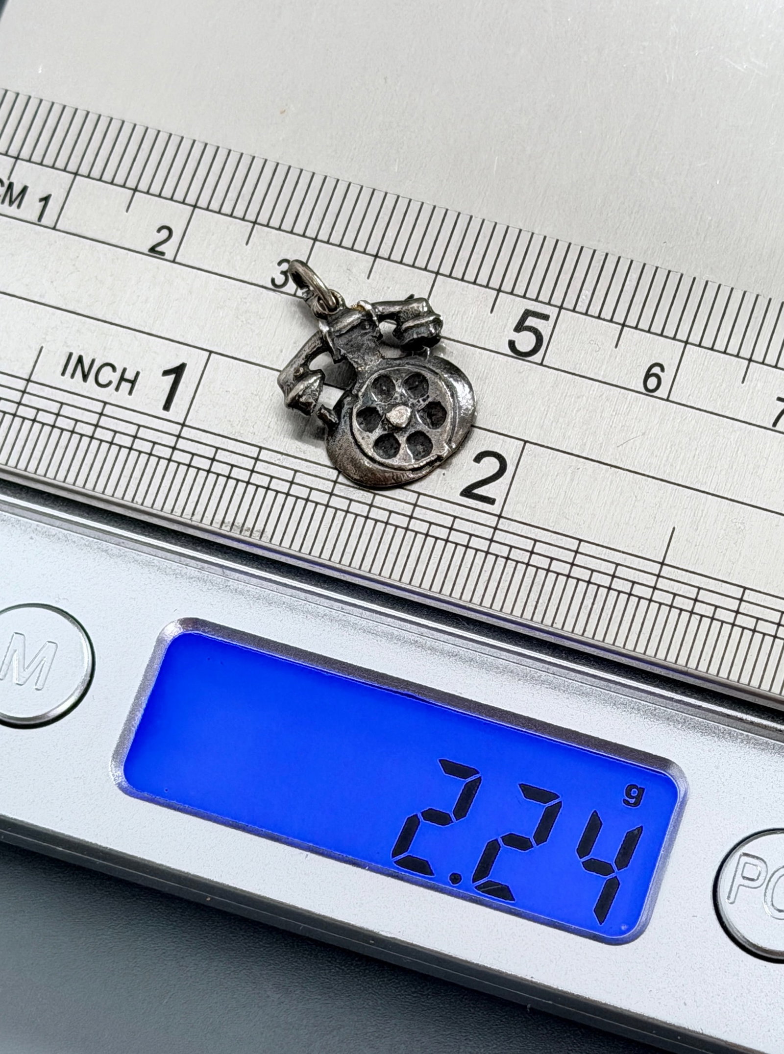 Vintage 925 Sterling Silver Rotary Dial Telephone 3D Charm Pendant 2.24g: Vintage 925 Sterling Silver Rotary Dial Telephone 3D Charm Pendant 2.24g Approximately Approximately 5/8 x 5/8 inches.