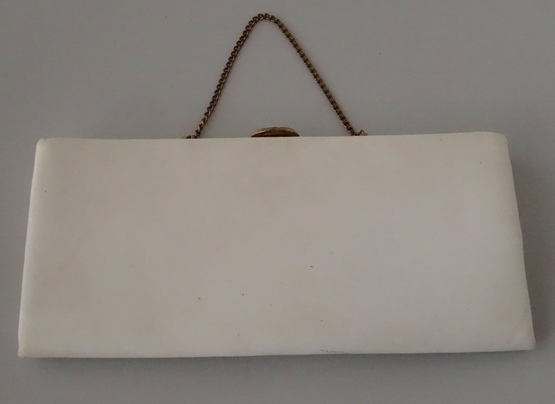 Vintage 60s White Clutch Purse Theatrical Prop: Vintage 60s White Clutch Purse Theatrical Prop Approximately 12 9/16” x 5 7/8”.