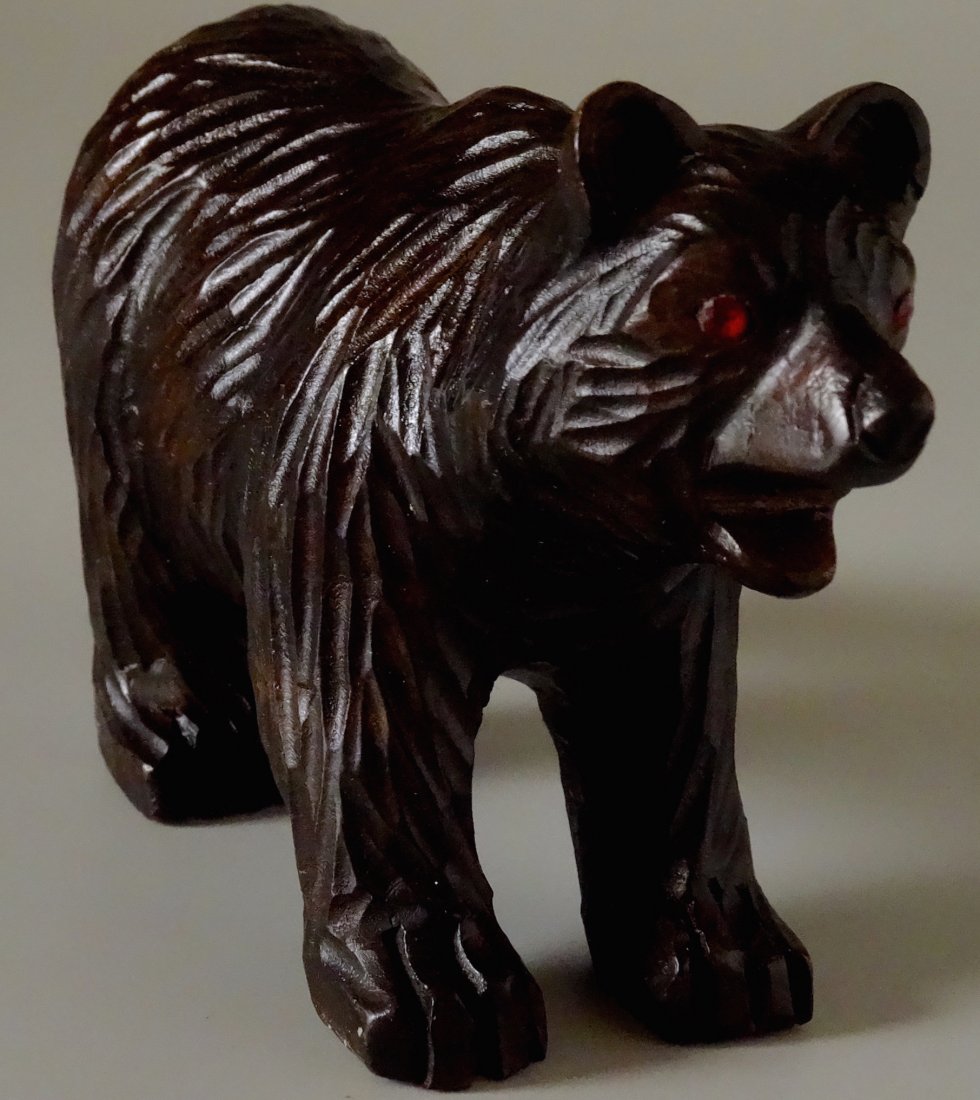 Black Forest Carved Wood Bear Figurine Ruby Red Jeweled: Black Forest Carved Wood Bear Figurine Ruby Red Jeweled Eyes Approximately 4" tall.