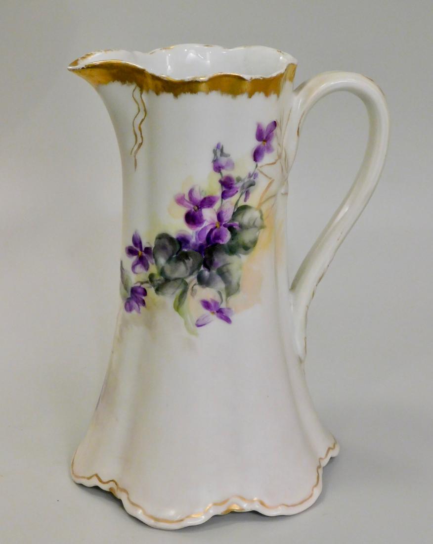 French Antique Haviland Porcelain Violet Painted: French Antique Haviland Porcelain Violet Painted Pitcher Approximately 9 inches tall. This lot is part of inventory from a closed antique store, which we will be auctioning during the next several mon