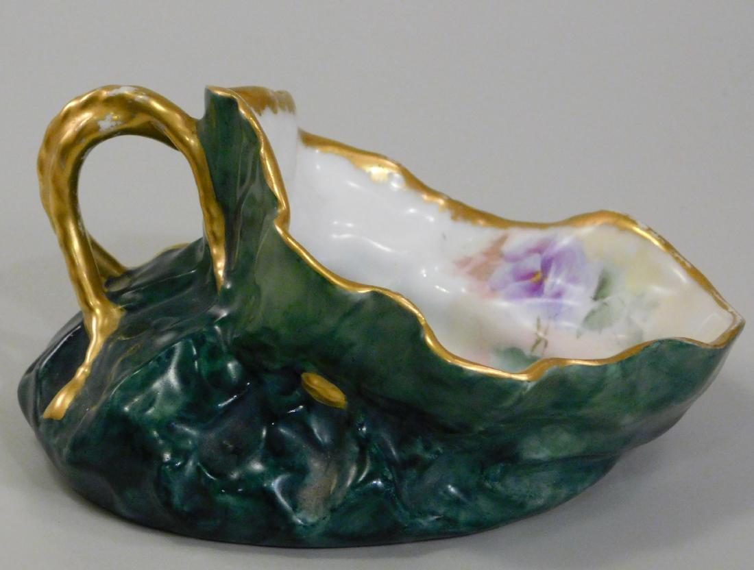 Tressemann & Vogt French Limoges Porcelain T&V Sack: Tressemann & Vogt French Limoges Porcelain T&V Sack Form Vase Painted Violets Approximately 5 1/8 x4 Â½ x 3 1/16 inches tall. This lot is part of inventory from a closed antique store, which we will