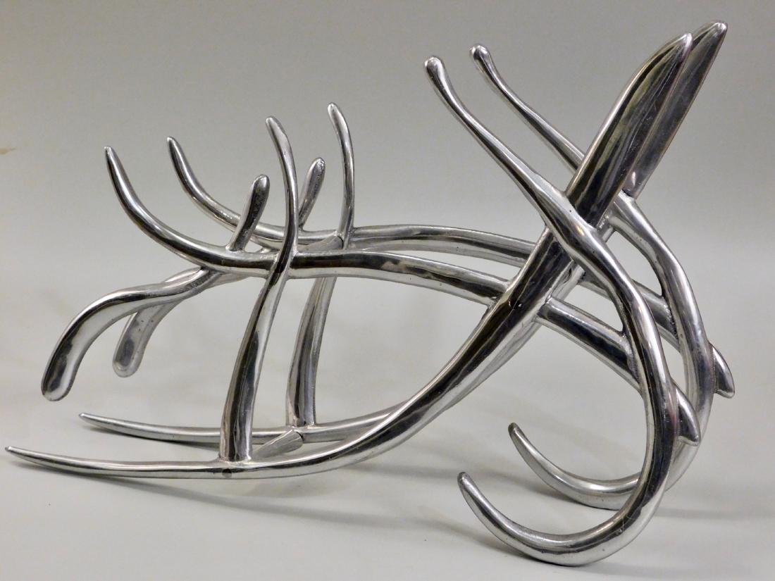 Contemporary Designer Abstract Pewter Wine Rack Bottle: Contemporary Designer Abstract Pewter Wine Rack Bottle Holder Approximately 17 x 4 Â½ x 11 5/16 inches. This lot is part of inventory from a closed antique store, which we will be auctioning during 