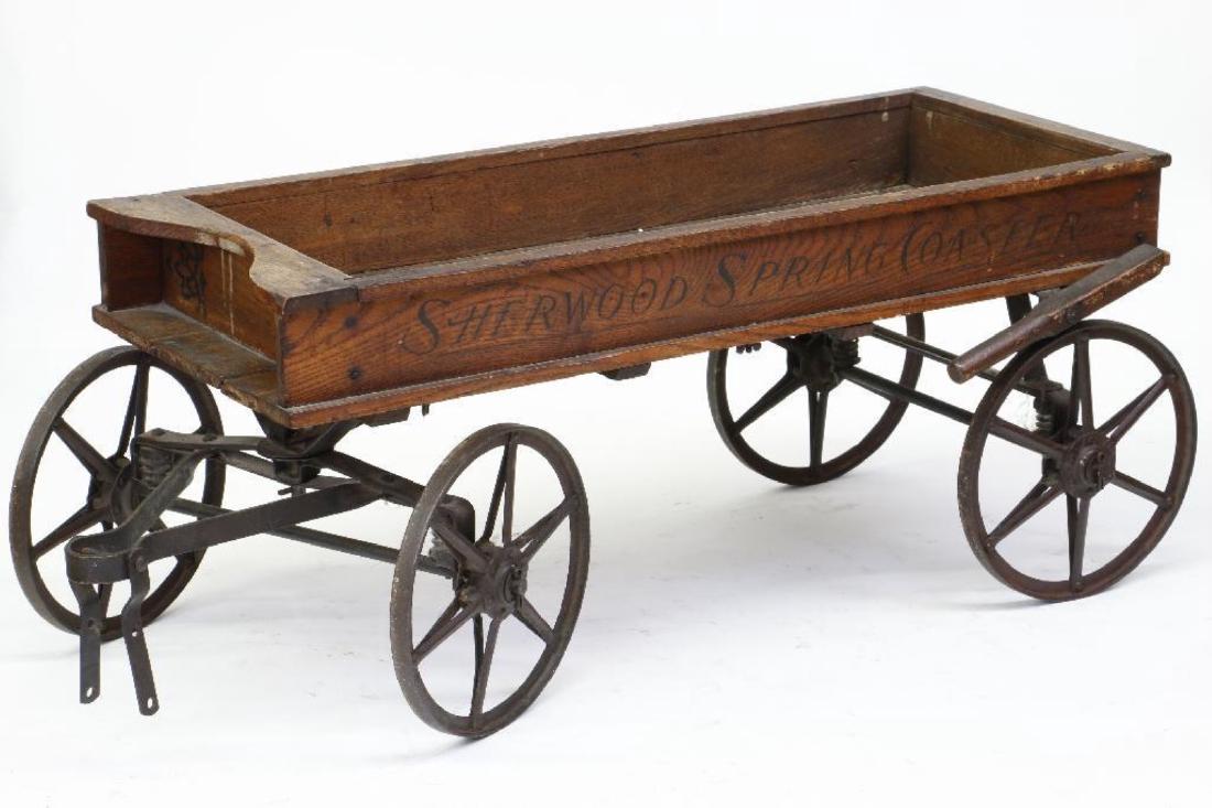 A SHERWOOD SPRING COASTER, 19THC.: DIMENSIONS HEIGHT 15 INCHES, WIDTH 40 INCHES, DEPTH 14 INCHES 