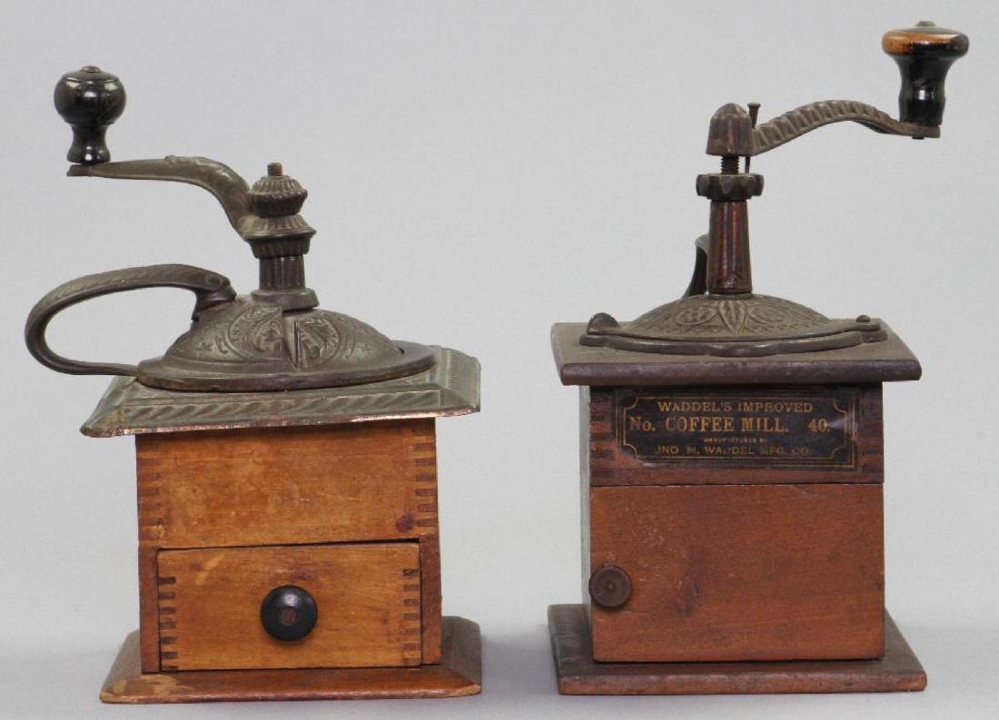 TWO CAST IRON AND WOOD COFFEE GRINDERS, 19THC. (1 of 3)