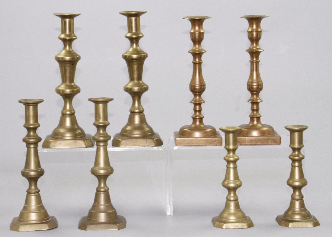 FOUR PAIR OF BRASS AND BELL METAL CANDLESTICK (1 of 2)