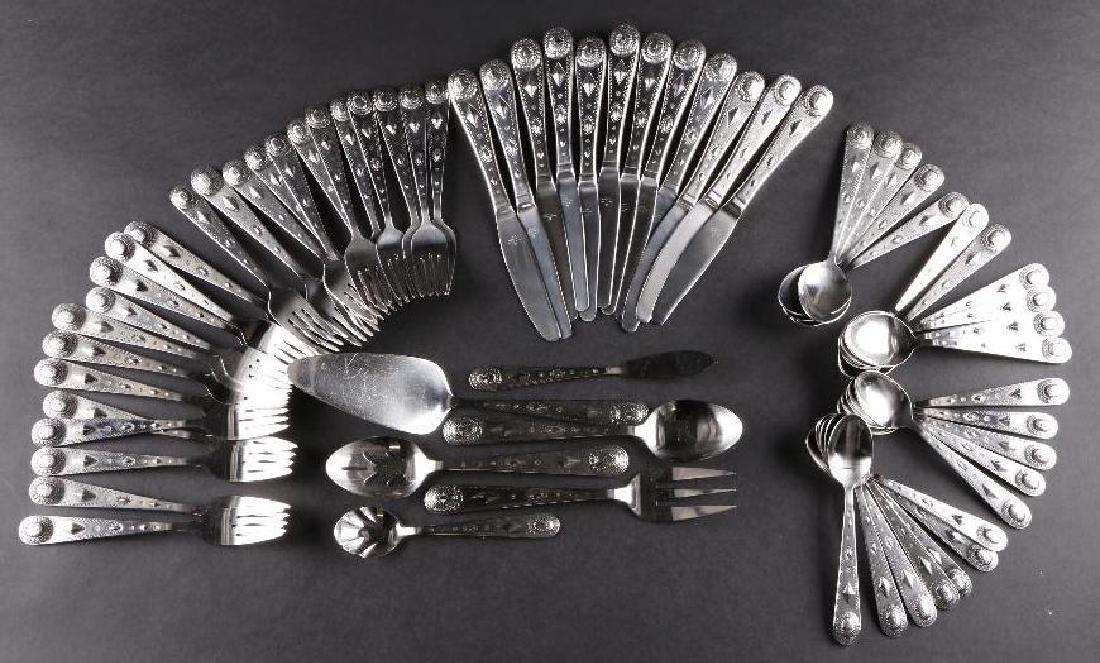 Serving for 12 tableware in the Navajo style: Wallace, 18/8 stainless, "el Rancho Pattern", one tablespoon lacking.