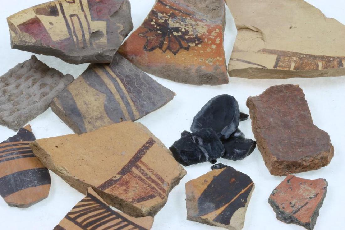 Group of ancient Southwest pottery shards: Along with several obsidian flakes Variety of sizes, largest being approximately 3-4 inches