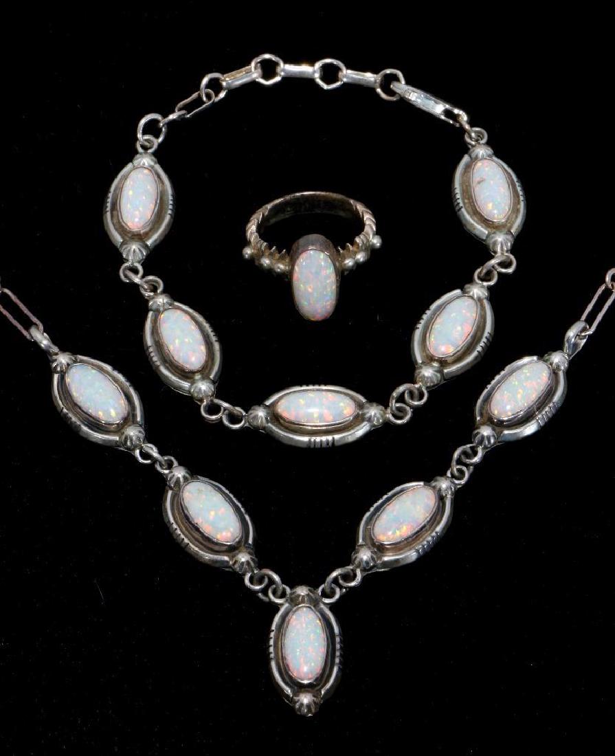 SOUTHWEST VINTAGE PAWN JEWELRY: Southwest Vintage Pawn jewelry, consisting of a silver and Opal bracelet, matching necklace and ring.