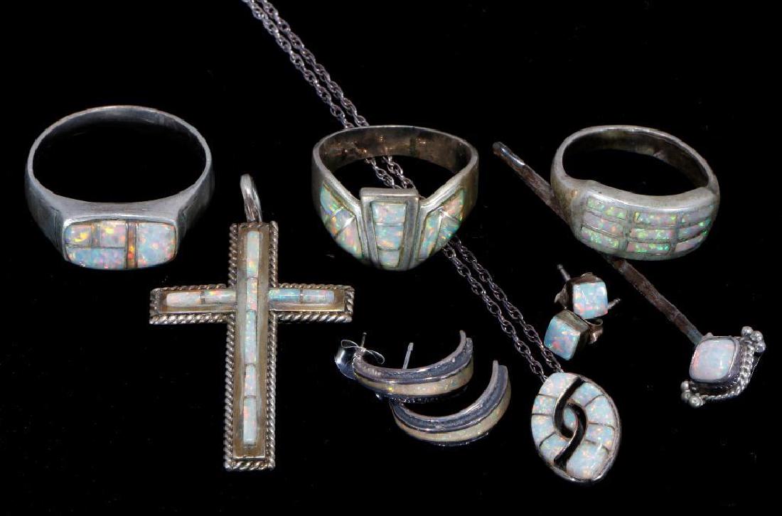 SOUTHWEST VINTAGE PAWN JEWELRY: Southwest Vintage Pawn jewelry, consisting of a silver and Opal rings,